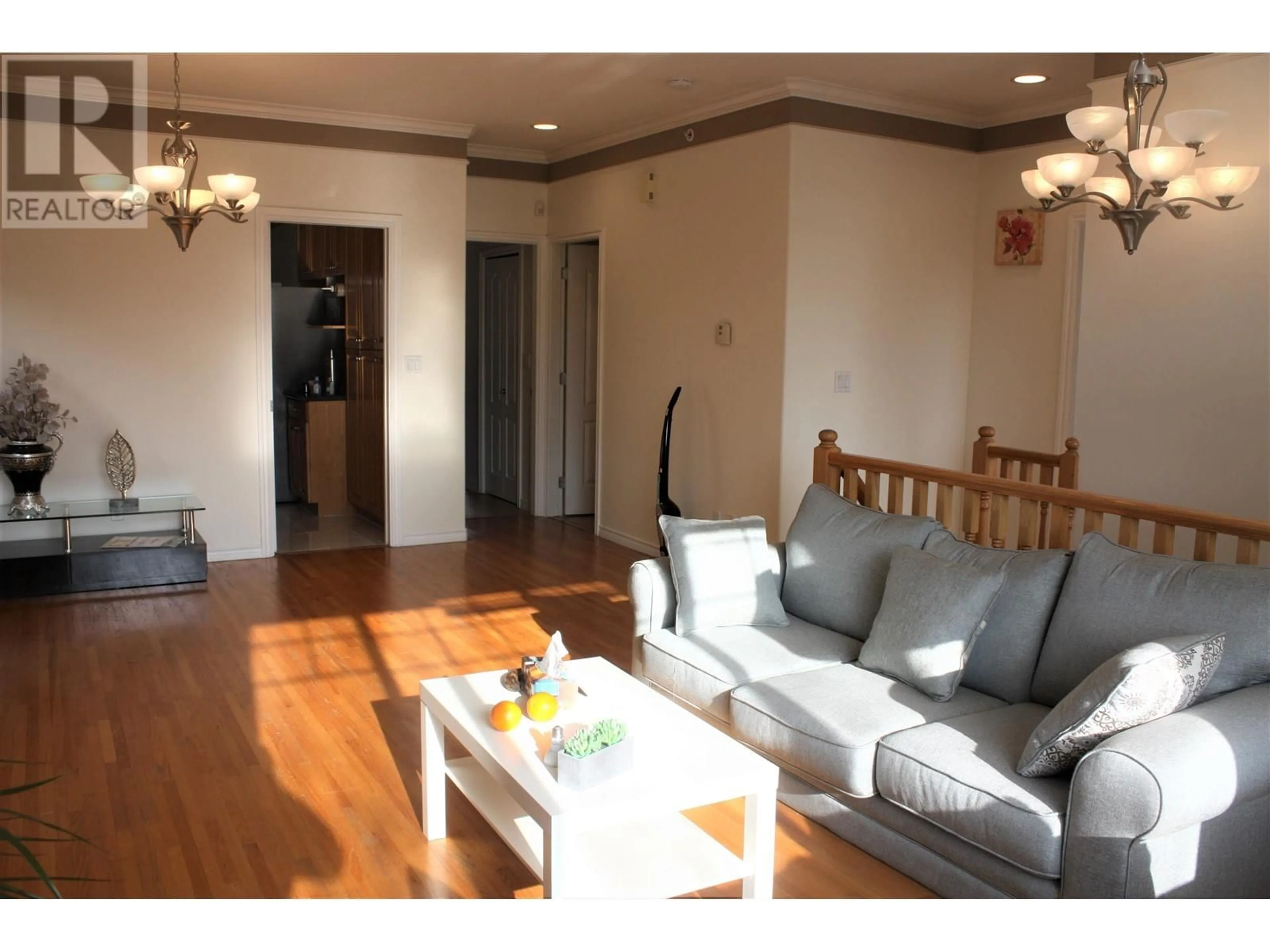 Living room with furniture, wood/laminate floor for 2529 FRANKLIN STREET, Vancouver British Columbia V5K1X5