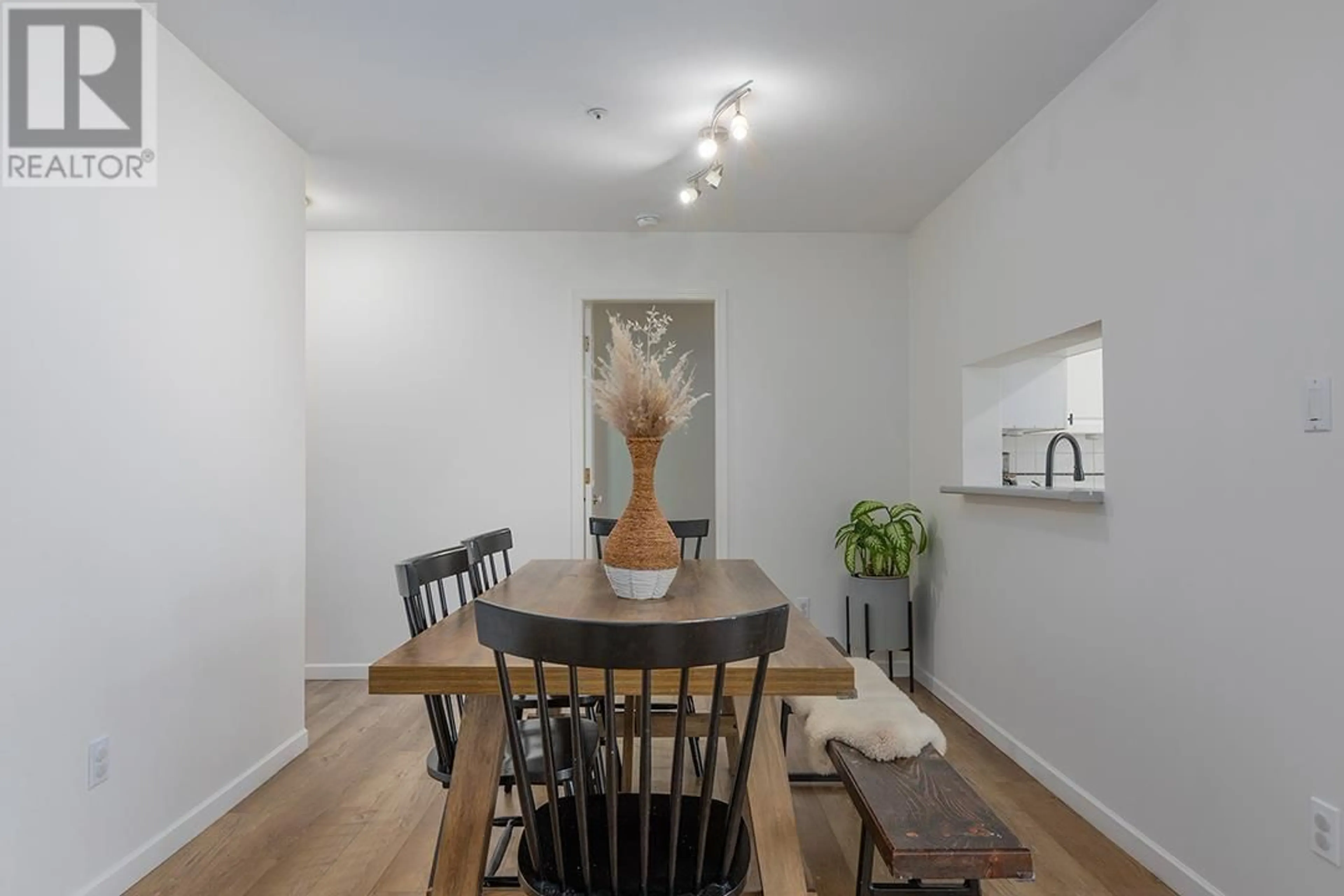 Dining room, wood/laminate floor for 208 - 2285 PITT RIVER ROAD, Port Coquitlam British Columbia V3C1R7