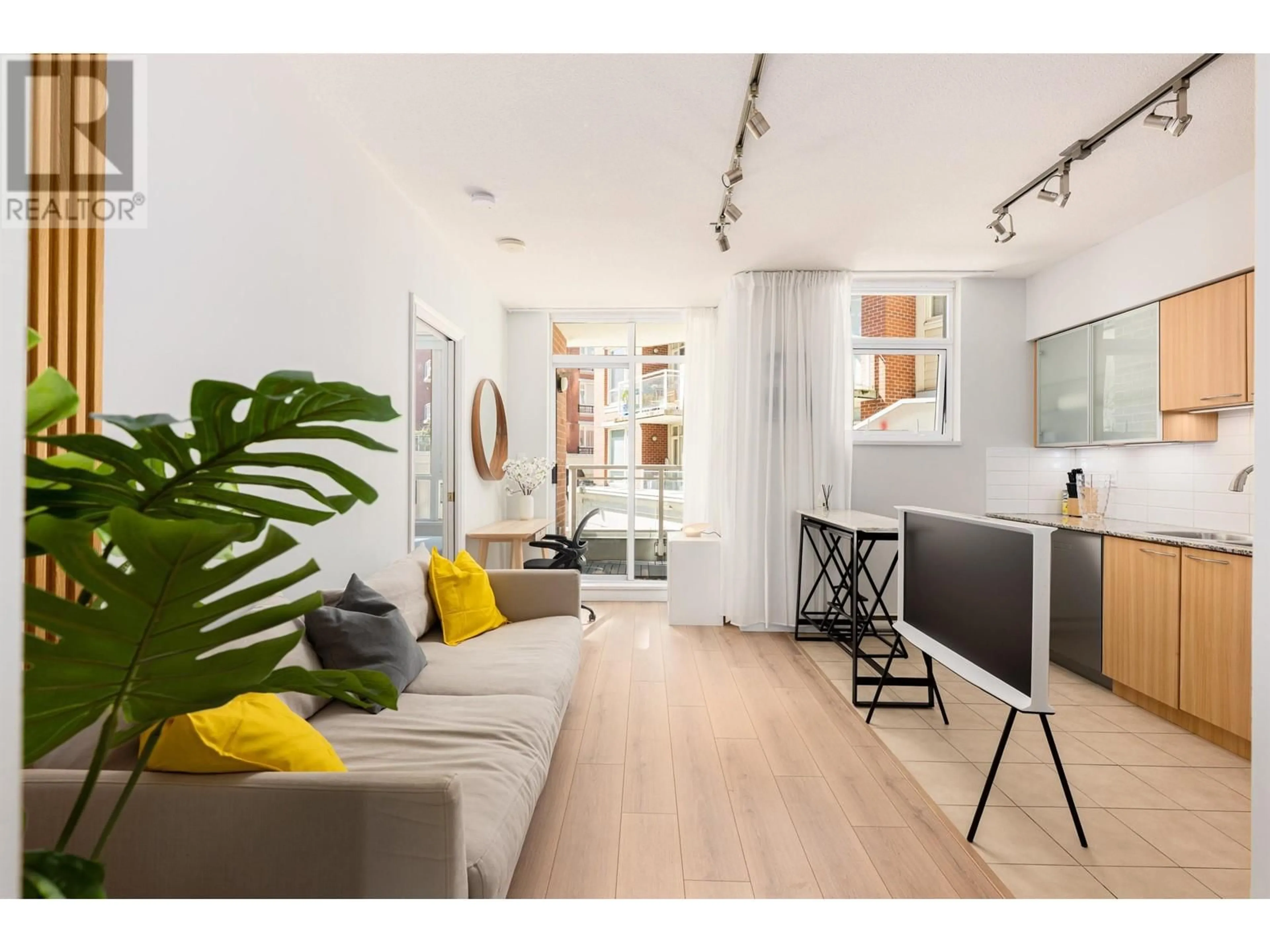 Living room with furniture, unknown for 320 - 4028 KNIGHT STREET, Vancouver British Columbia V5N5Y8