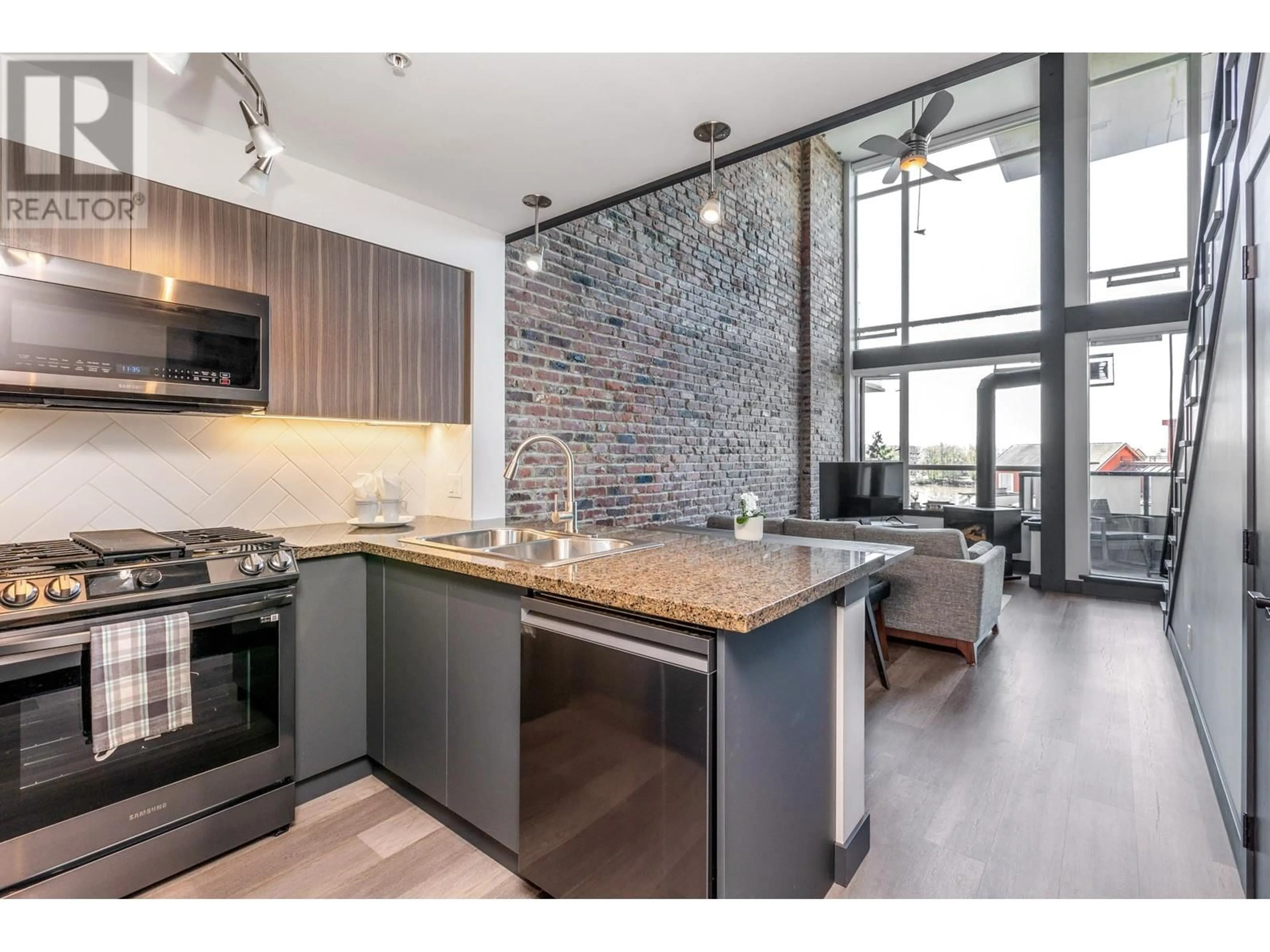 Open concept kitchen, unknown for 315 - 10 RENAISSANCE SQUARE, New Westminster British Columbia V3M7B1