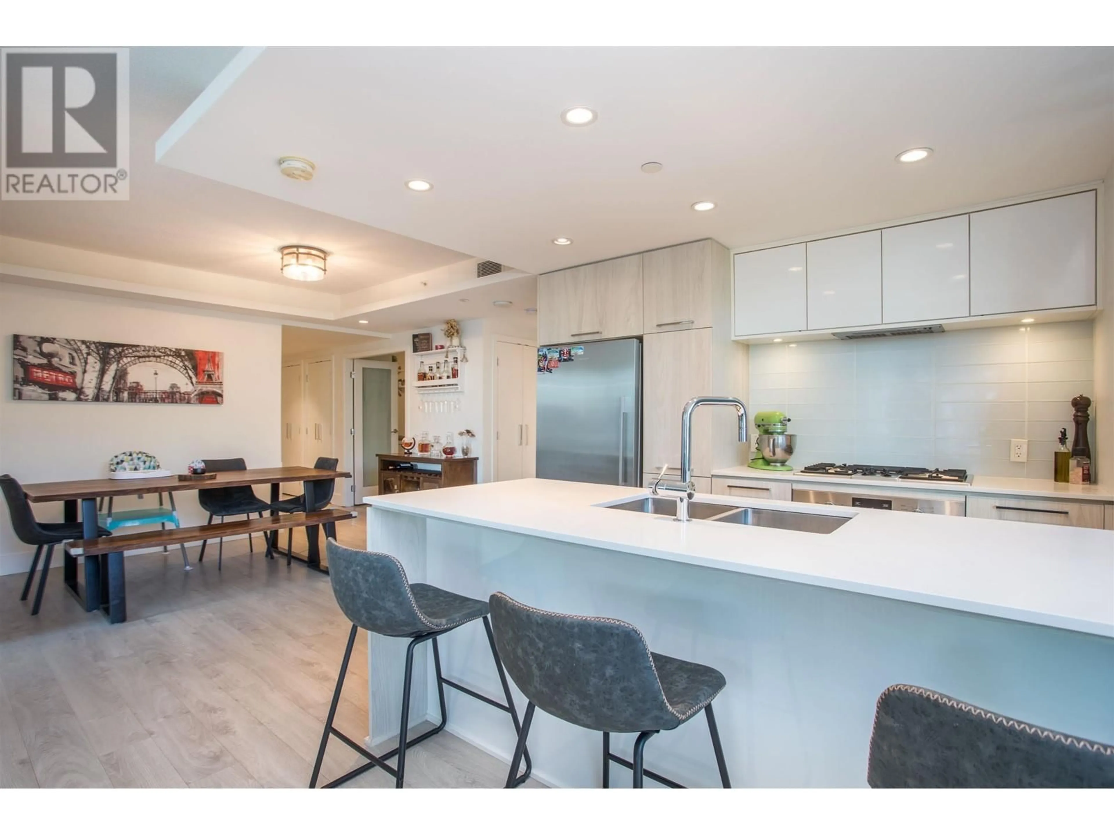 Open concept kitchen, ceramic/tile floor for 308 - 680 SEYLYNN CRESCENT, North Vancouver British Columbia V7J0B5