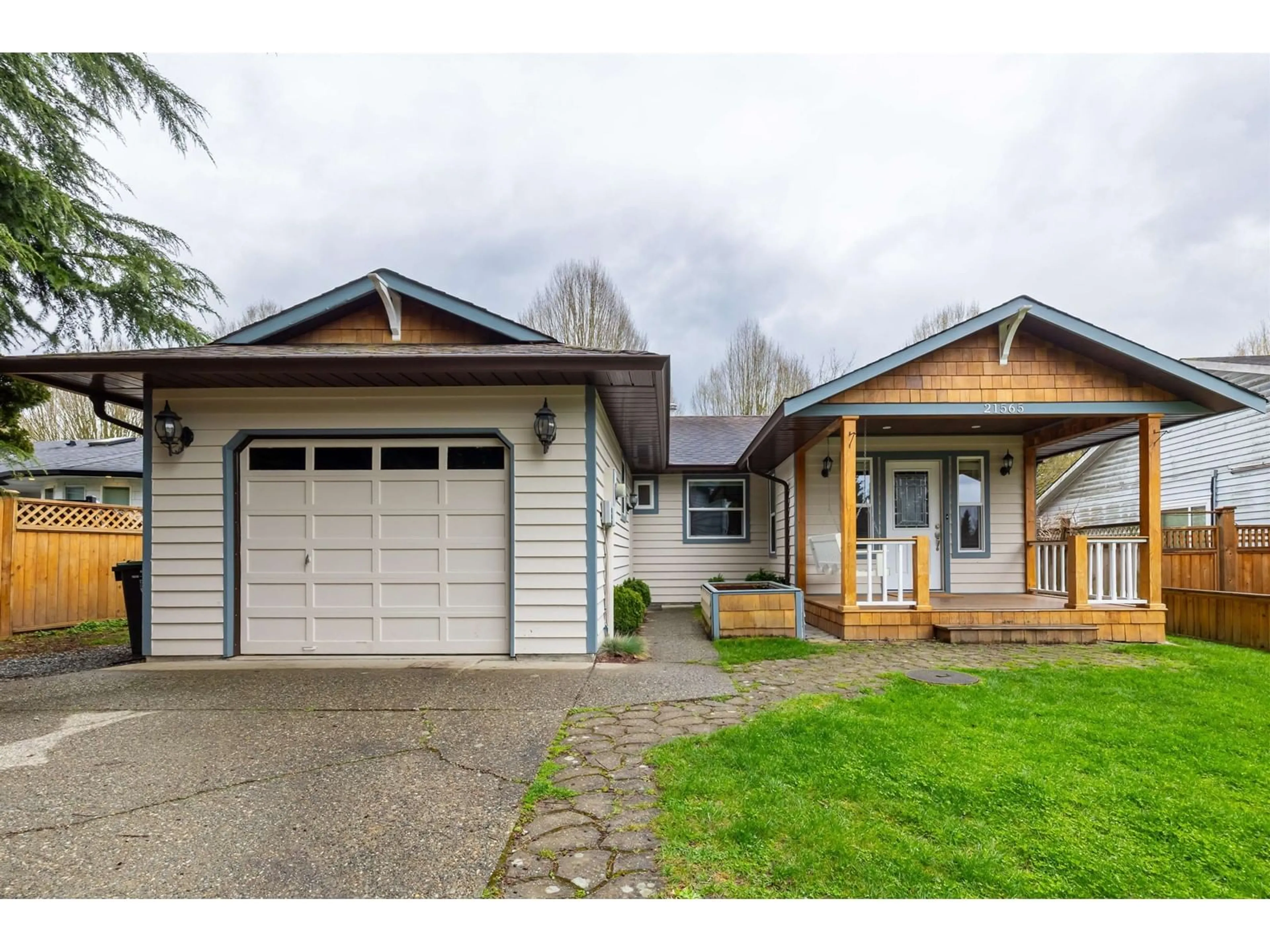 Home with vinyl exterior material, street for 21565 94A, Langley British Columbia V1M2A5