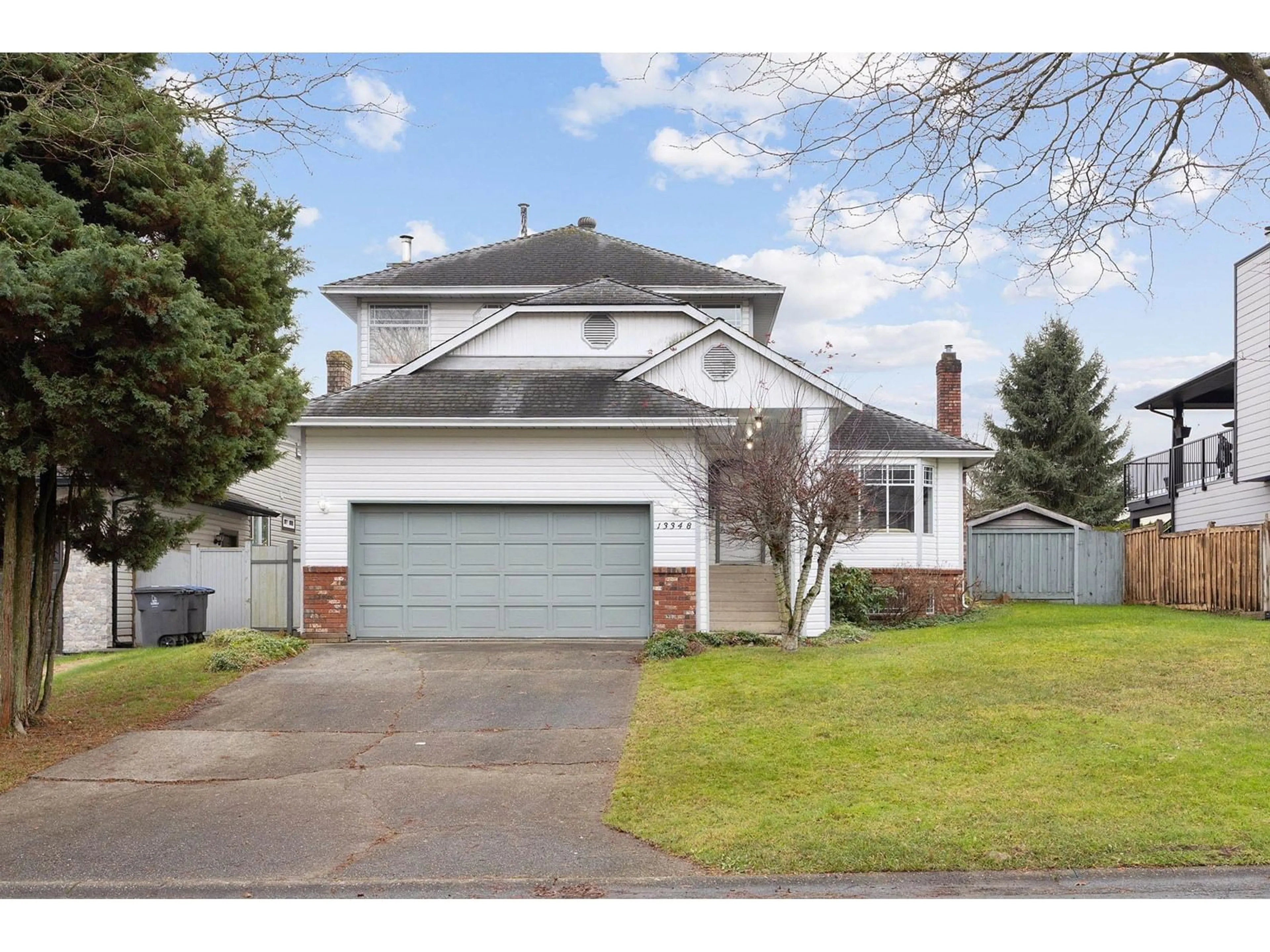 Home with vinyl exterior material, street for 13348 98, Surrey British Columbia V3T5M7