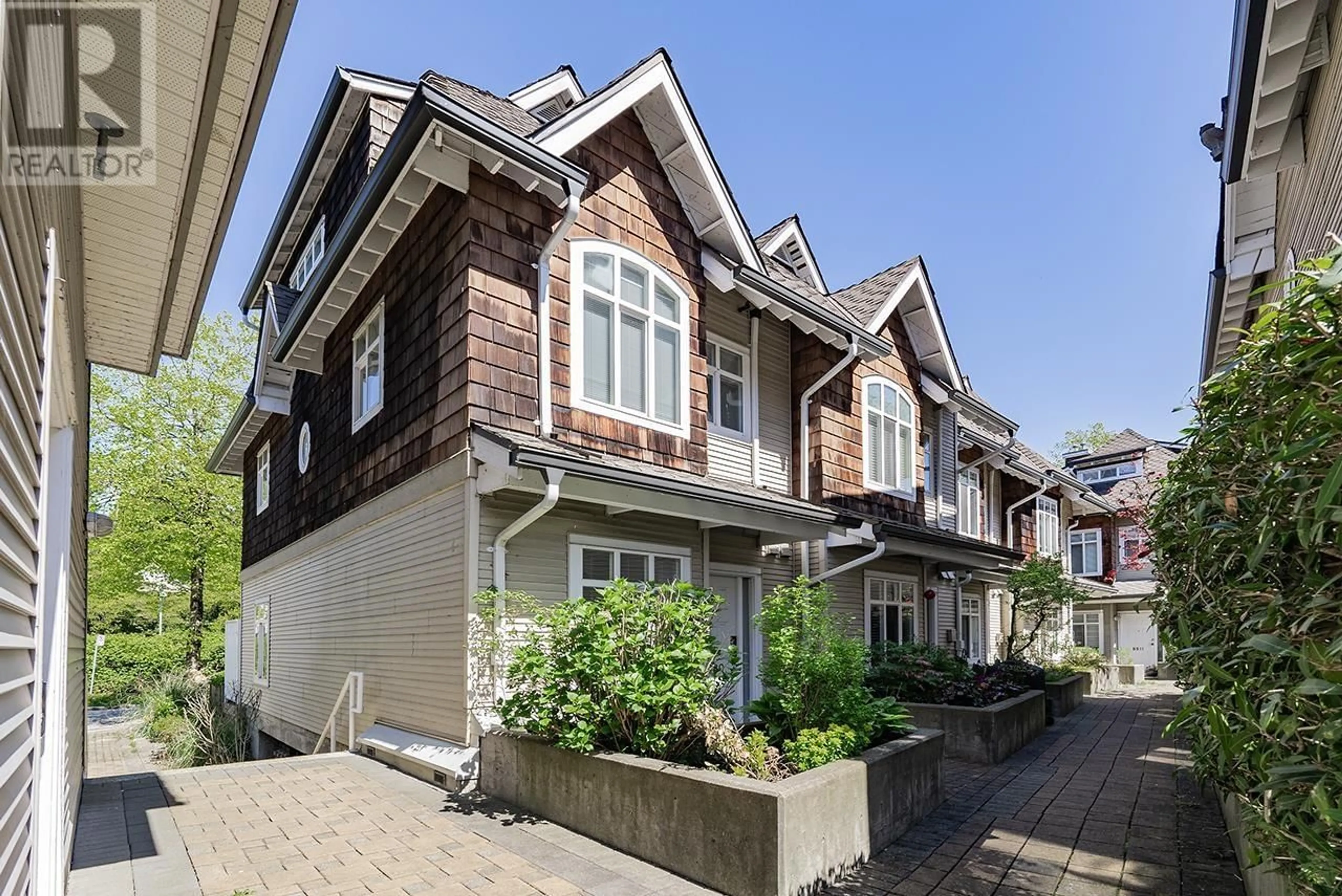 Home with brick exterior material, street for 2880 KENT AVENUE SOUTH, Vancouver British Columbia V5S4T4