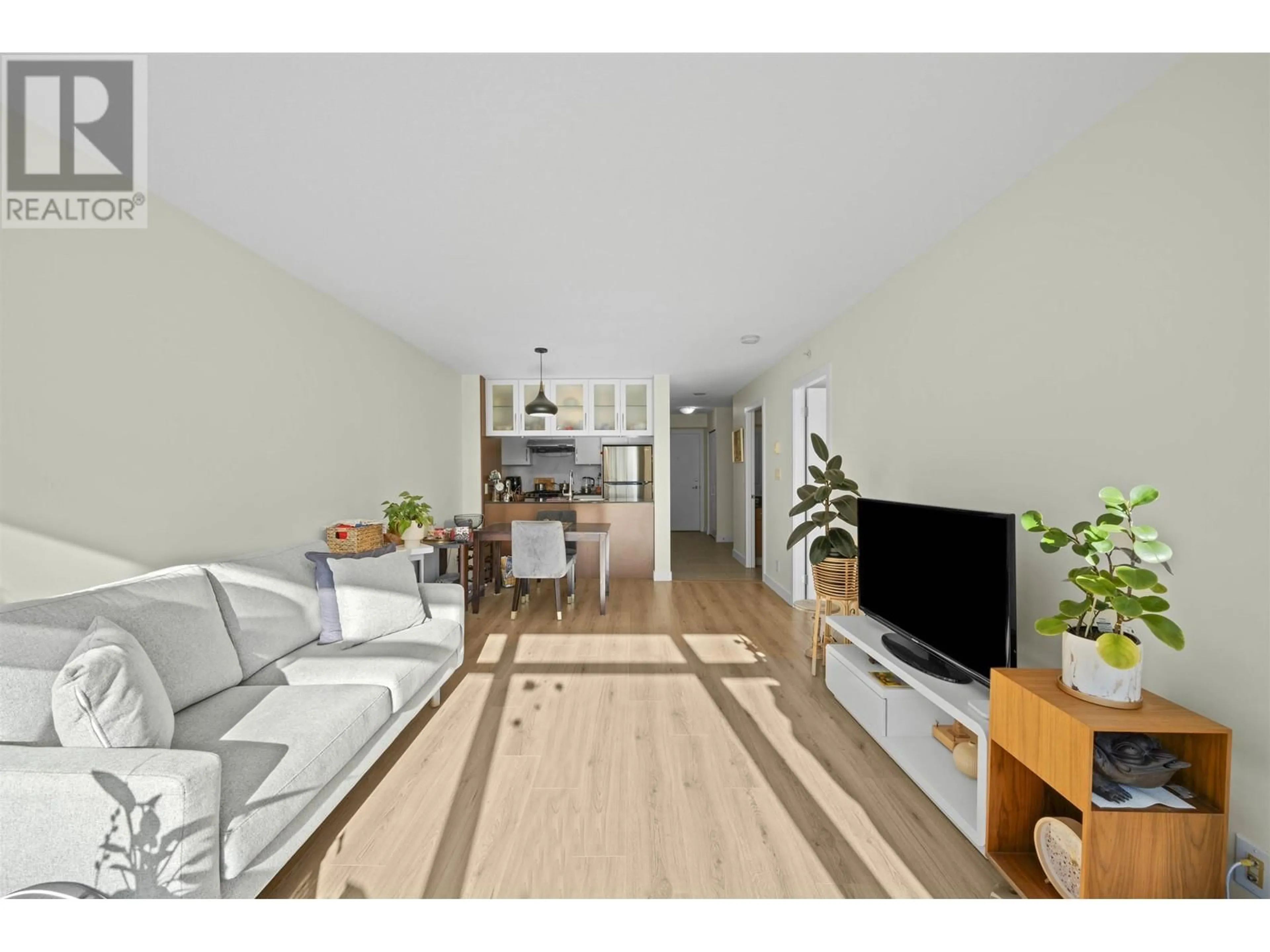 Living room with furniture, wood/laminate floor for 1205 - 6351 BUSWELL STREET, Richmond British Columbia V6Y0A4