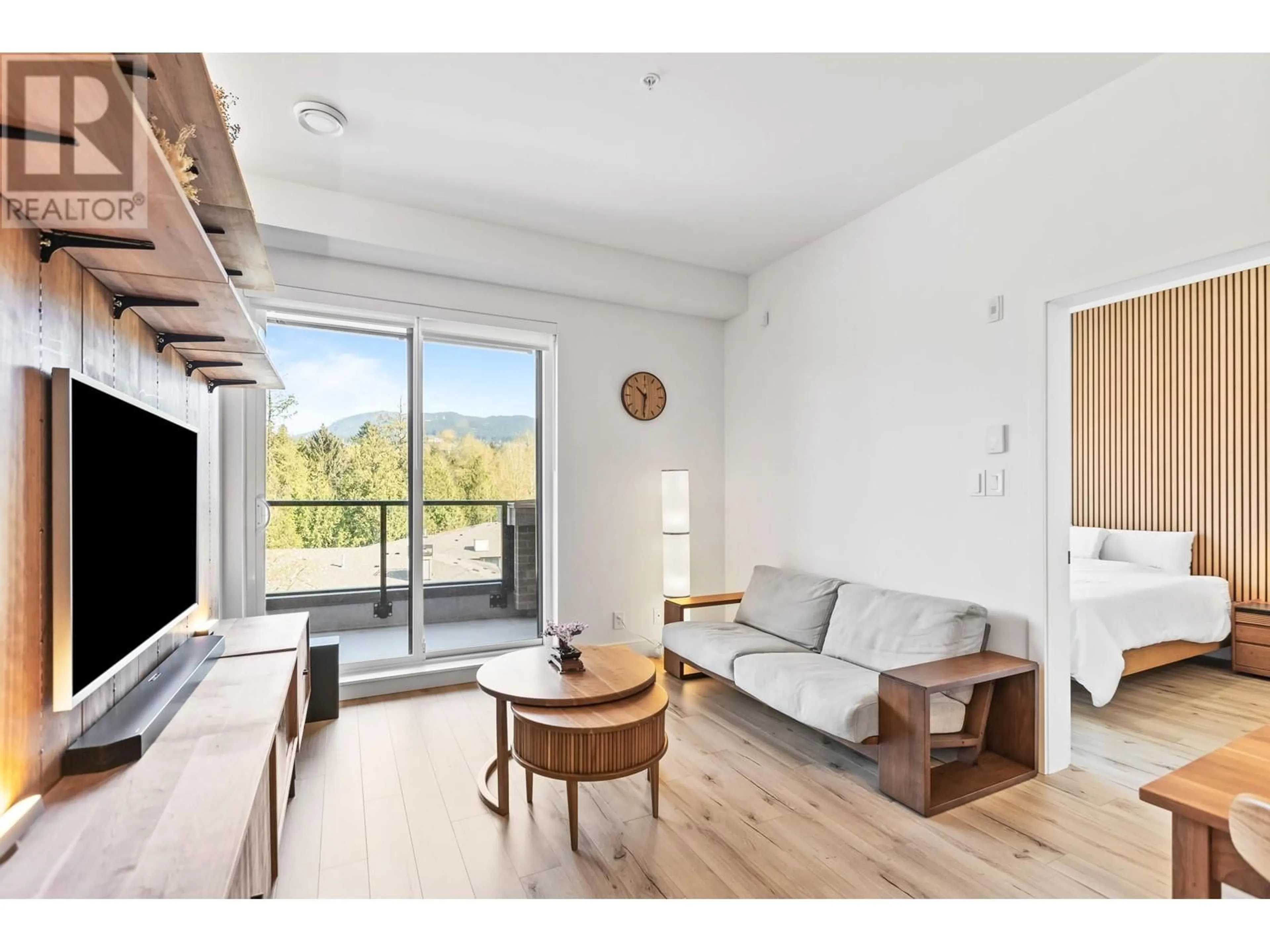 Living room with furniture, wood/laminate floor for 424 - 55 KLAHANIE DRIVE, Port Moody British Columbia V3H0M9