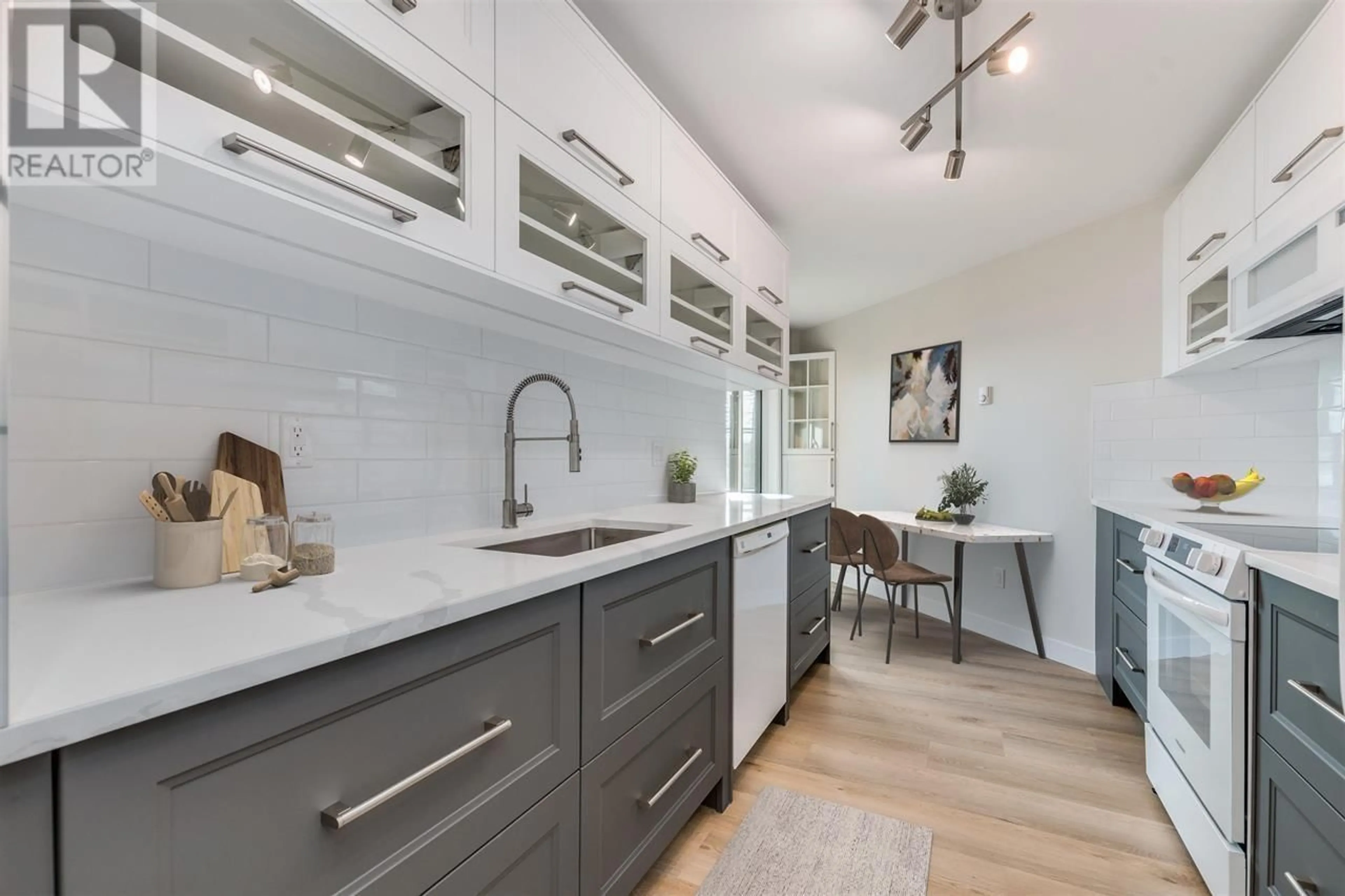 Open concept kitchen, ceramic/tile floor for 119 - 1150 QUAYSIDE DRIVE, New Westminster British Columbia V3M6E1