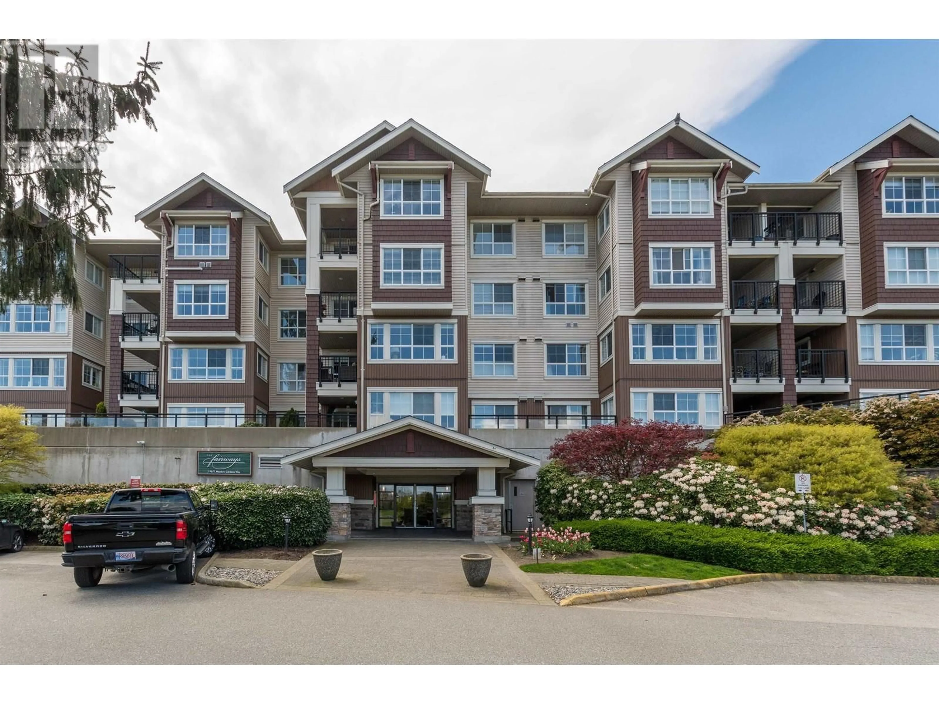 A pic from outside/outdoor area/front of a property/back of a property/a pic from drone, unknown for 423 - 19677 MEADOW GARDENS WAY, Pitt Meadows British Columbia V3Y0A2