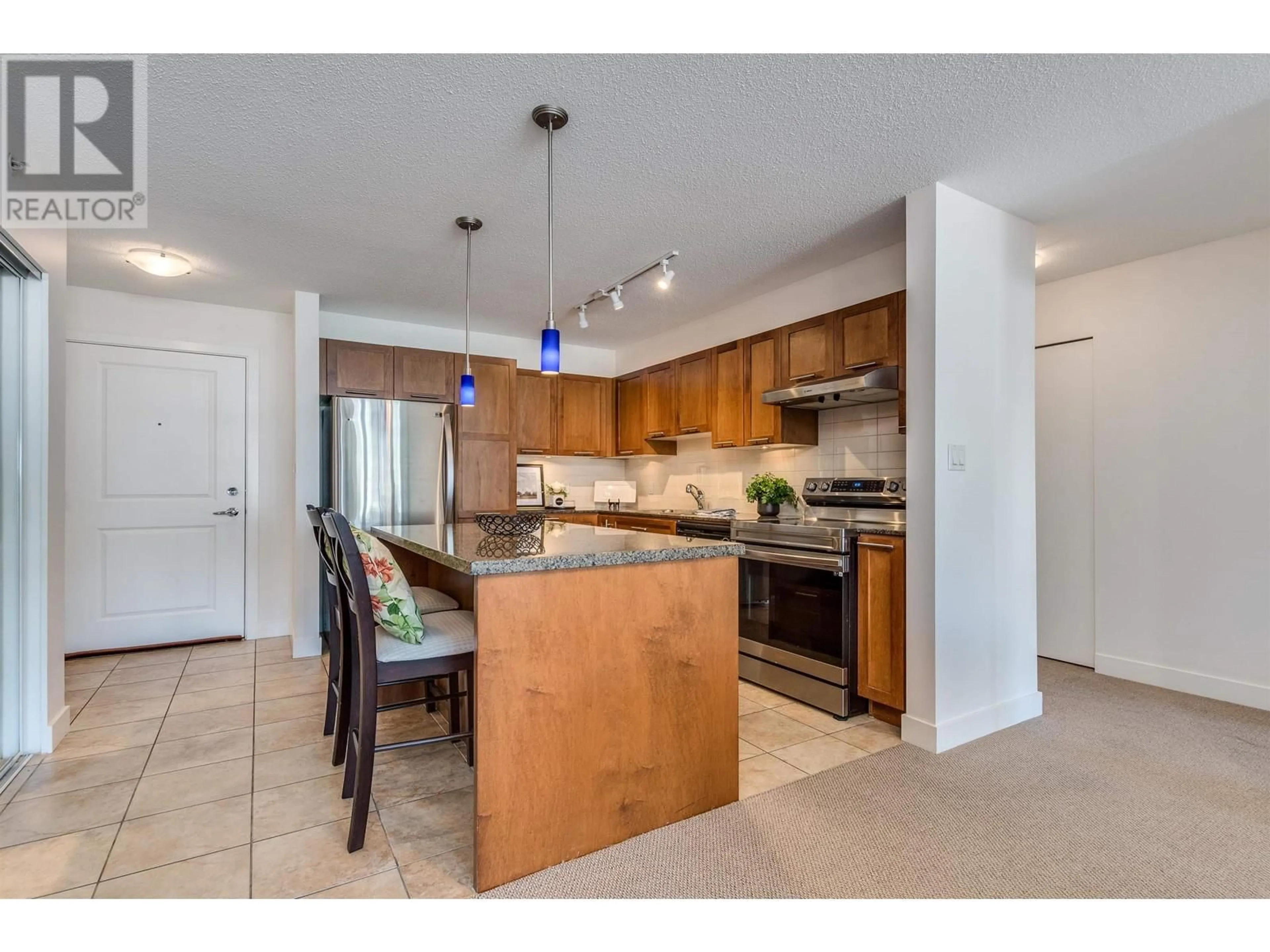 Open concept kitchen, unknown for 423 - 19677 MEADOW GARDENS WAY, Pitt Meadows British Columbia V3Y0A2