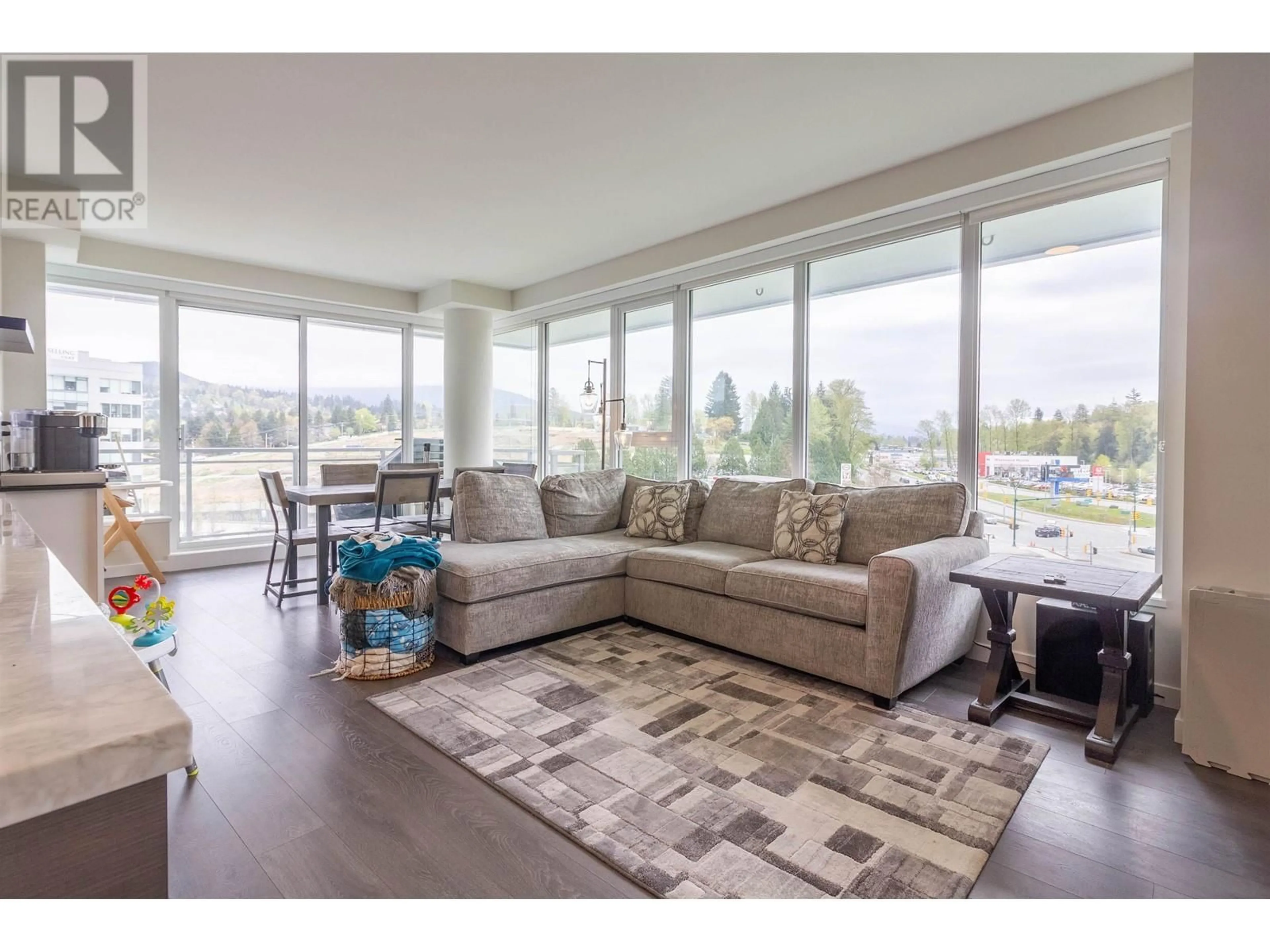 Living room with furniture, unknown for 1002 - 308 MORRISSEY ROAD, Port Moody British Columbia V3H0M2
