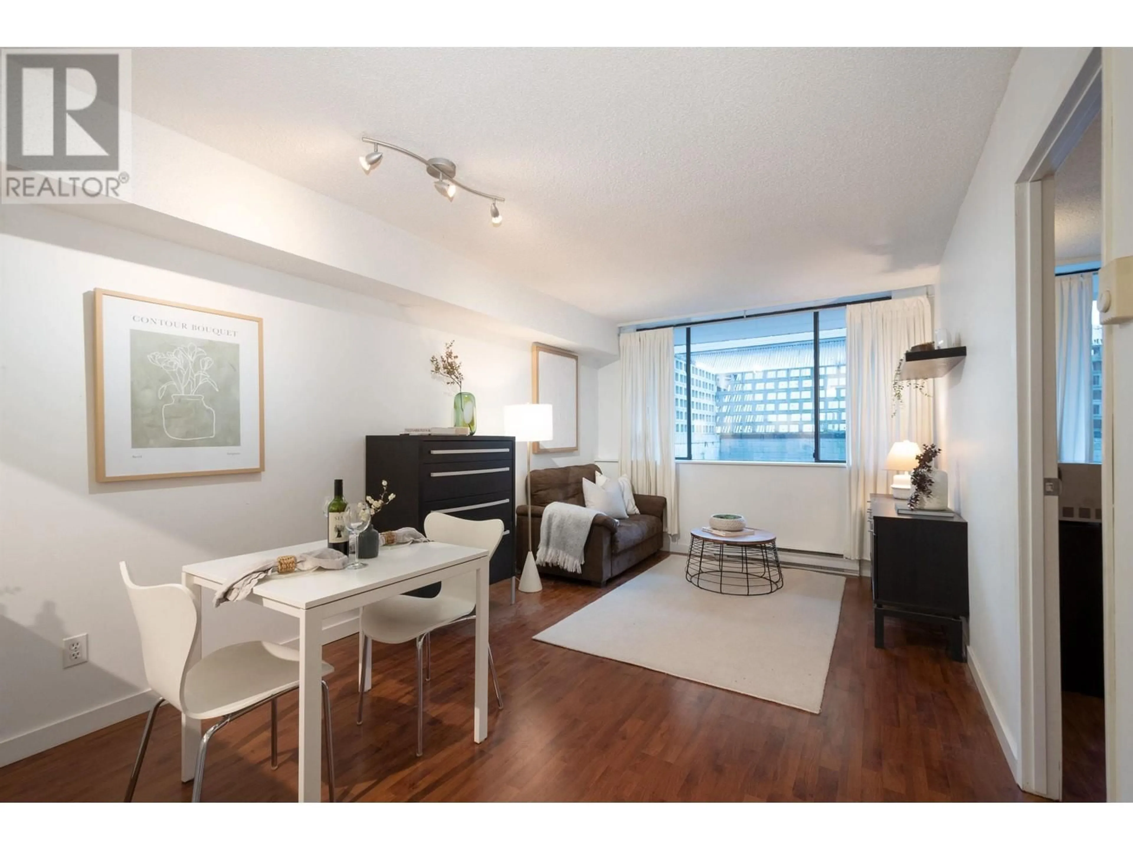Living room with furniture, wood/laminate floor for 201 - 1270 ROBSON STREET, Vancouver British Columbia V6E3Z6
