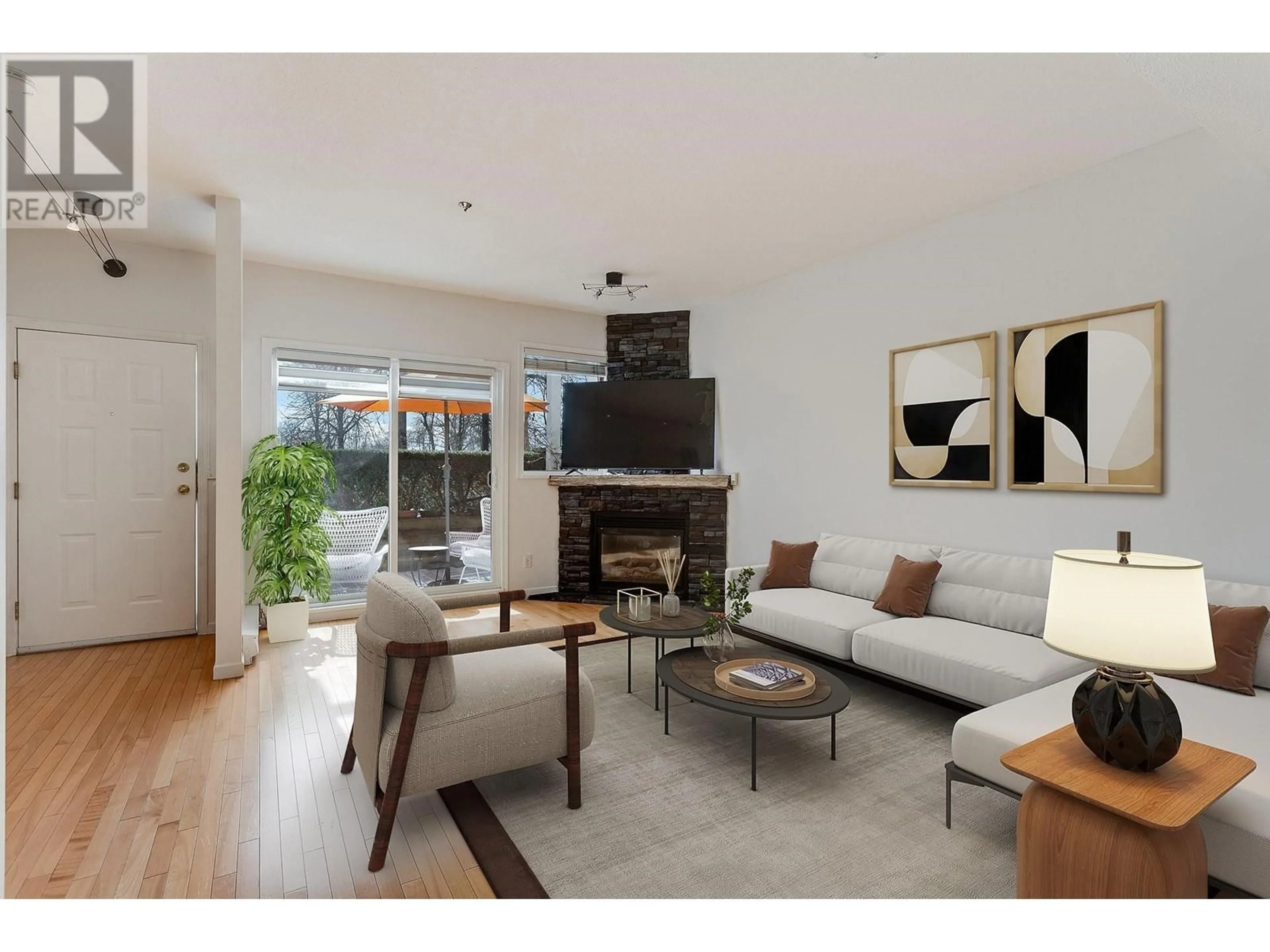 Living room with furniture, wood/laminate floor for 28 - 2723 KENT AVENUE, Vancouver British Columbia V5S3T9