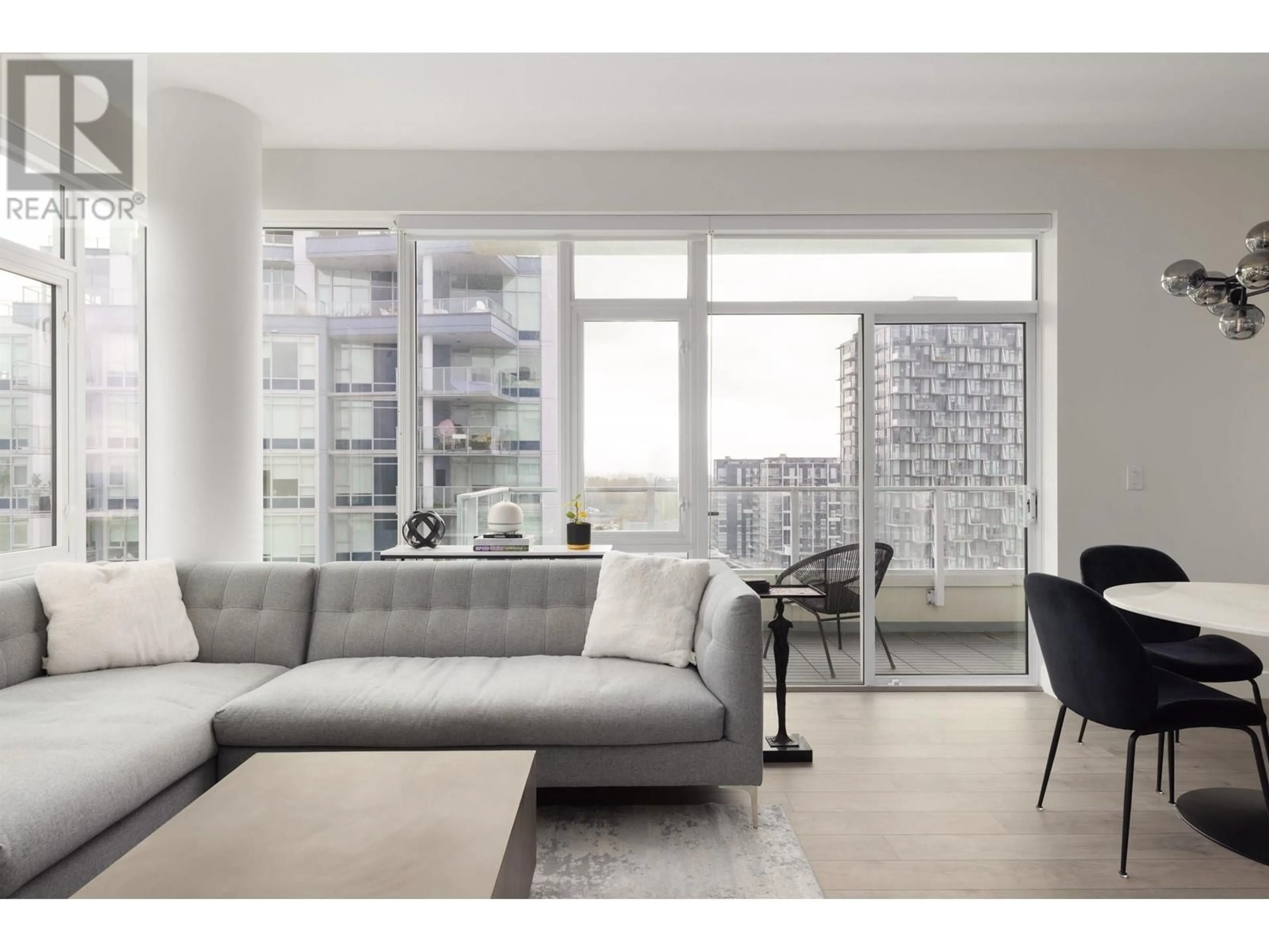 Living room with furniture, unknown for 1601 - 8533 RIVER DISTRICT, Vancouver British Columbia V5S0H2