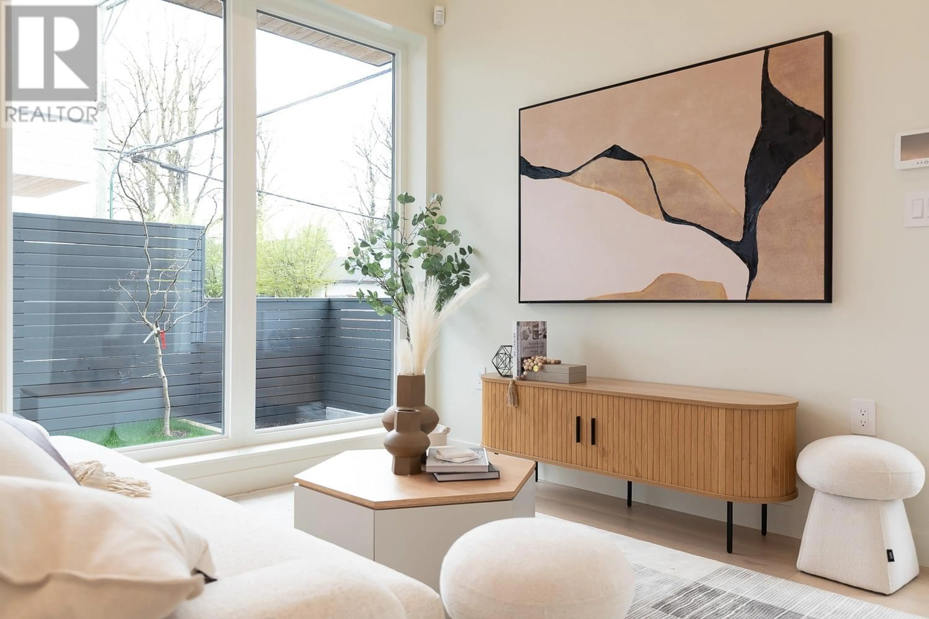 Living room with furniture, wood/laminate floor for 2670 38TH AVENUE, Vancouver British Columbia V5R3M7