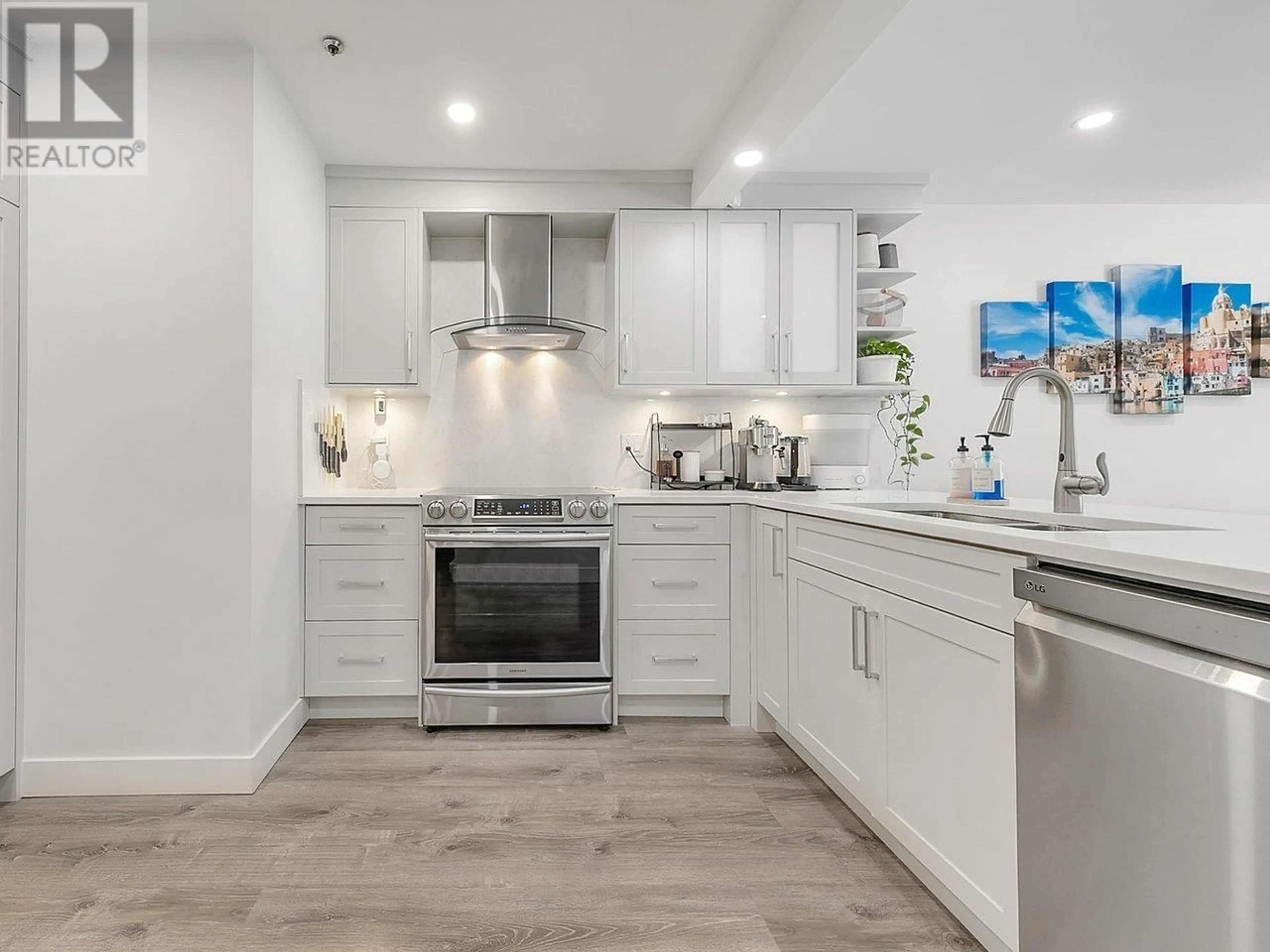Open concept kitchen, ceramic/tile floor for 105 - 1147 NELSON STREET, Vancouver British Columbia V6E1J3