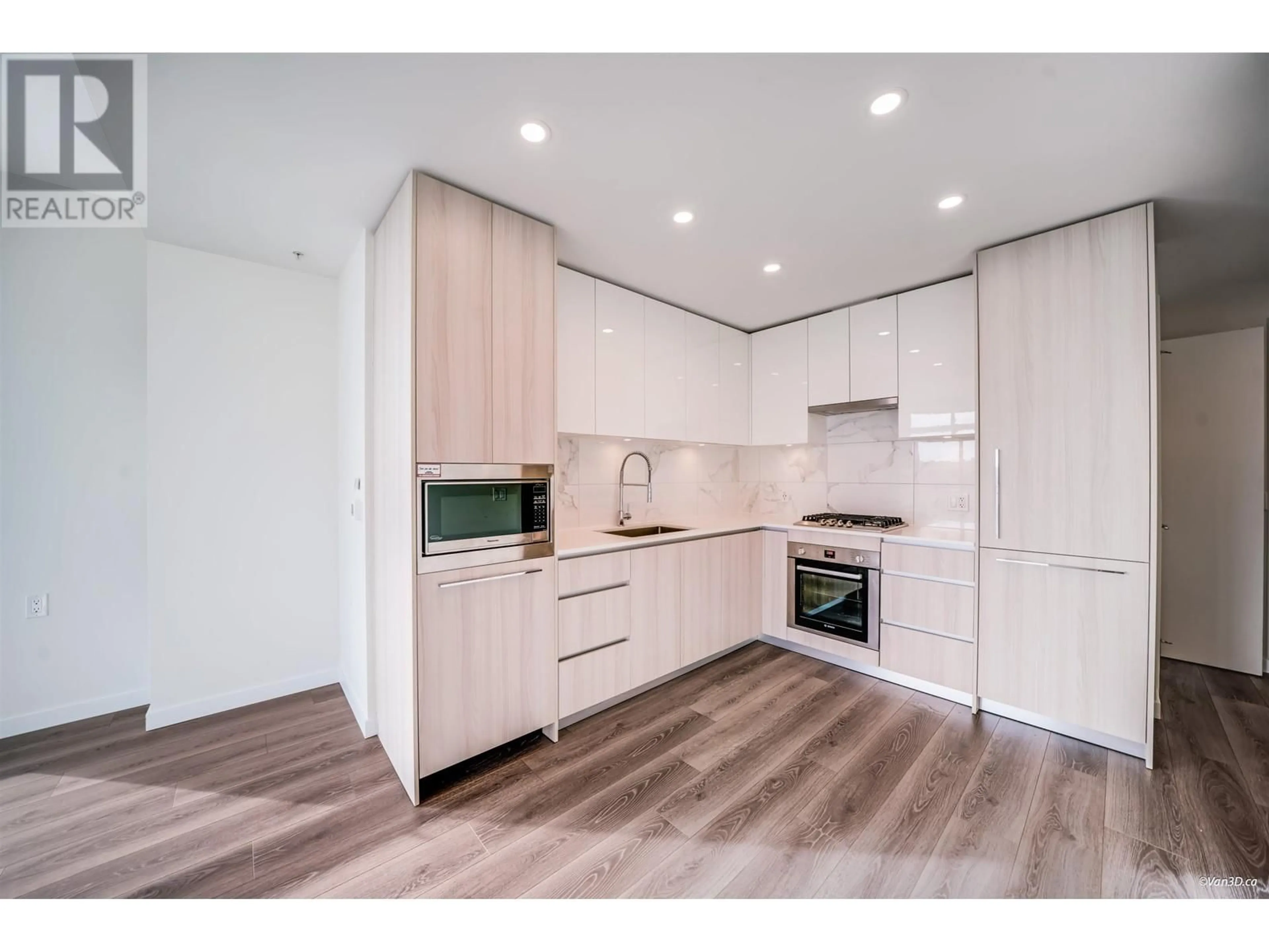 Open concept kitchen, wood/laminate floor for 1808 - 5311 GORING STREET, Burnaby British Columbia V5B0B5