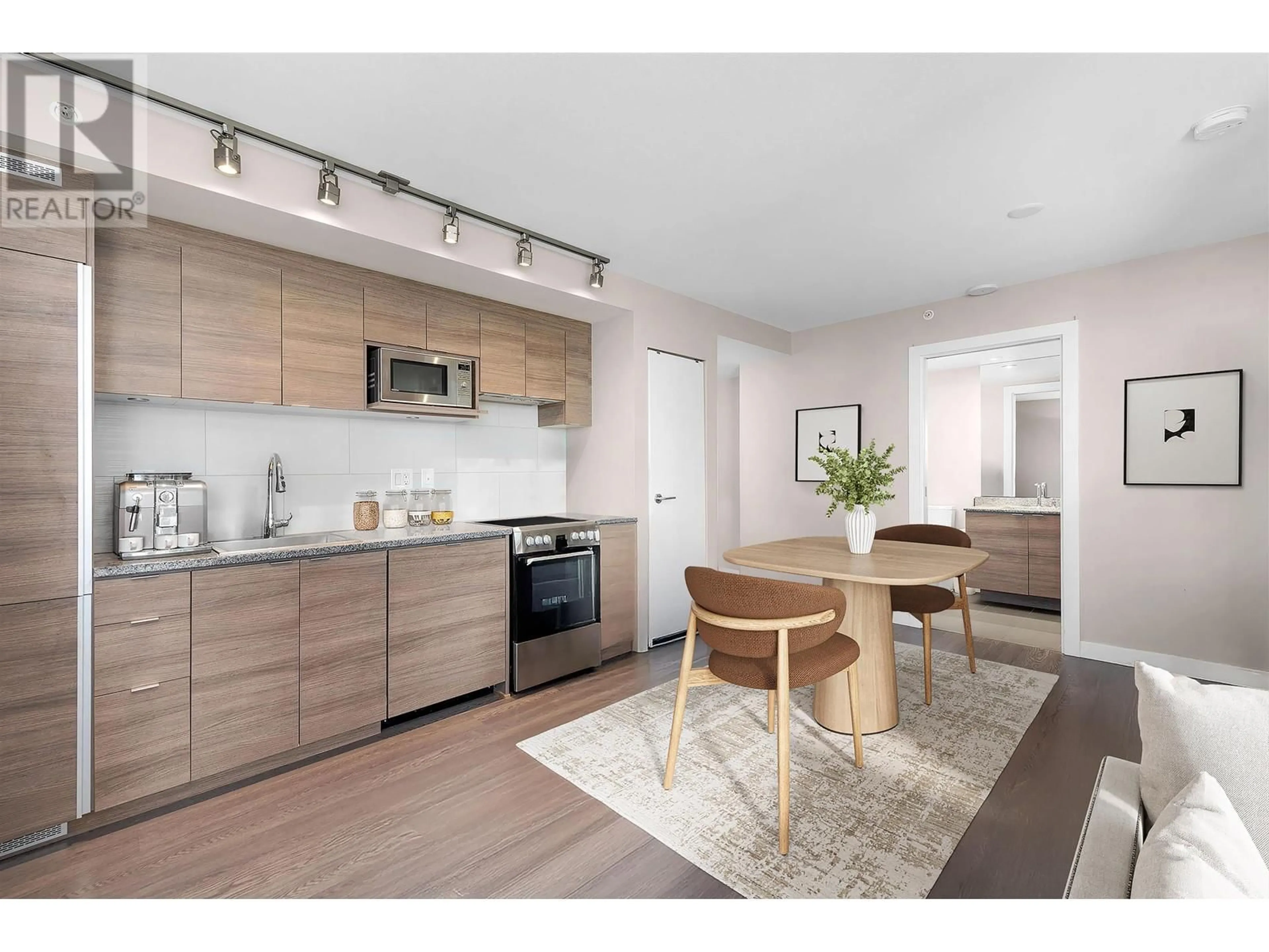 Open concept kitchen, wood/laminate floor for 1003 - 488 MARINE DRIVE, Vancouver British Columbia V5X0C6