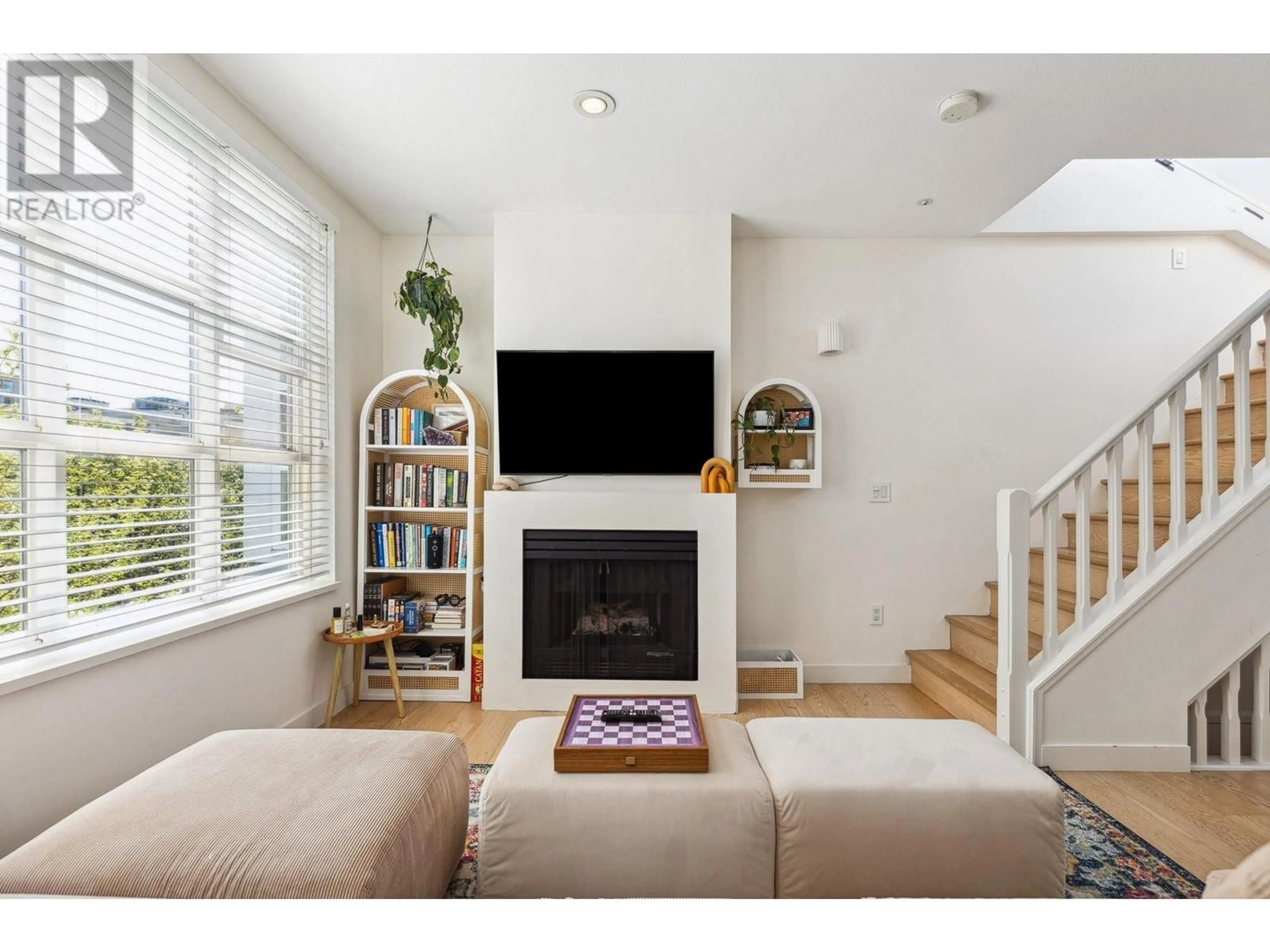 Living room with furniture, wood/laminate floor for 201 - 685 7TH AVENUE, Vancouver British Columbia V5Z1B6