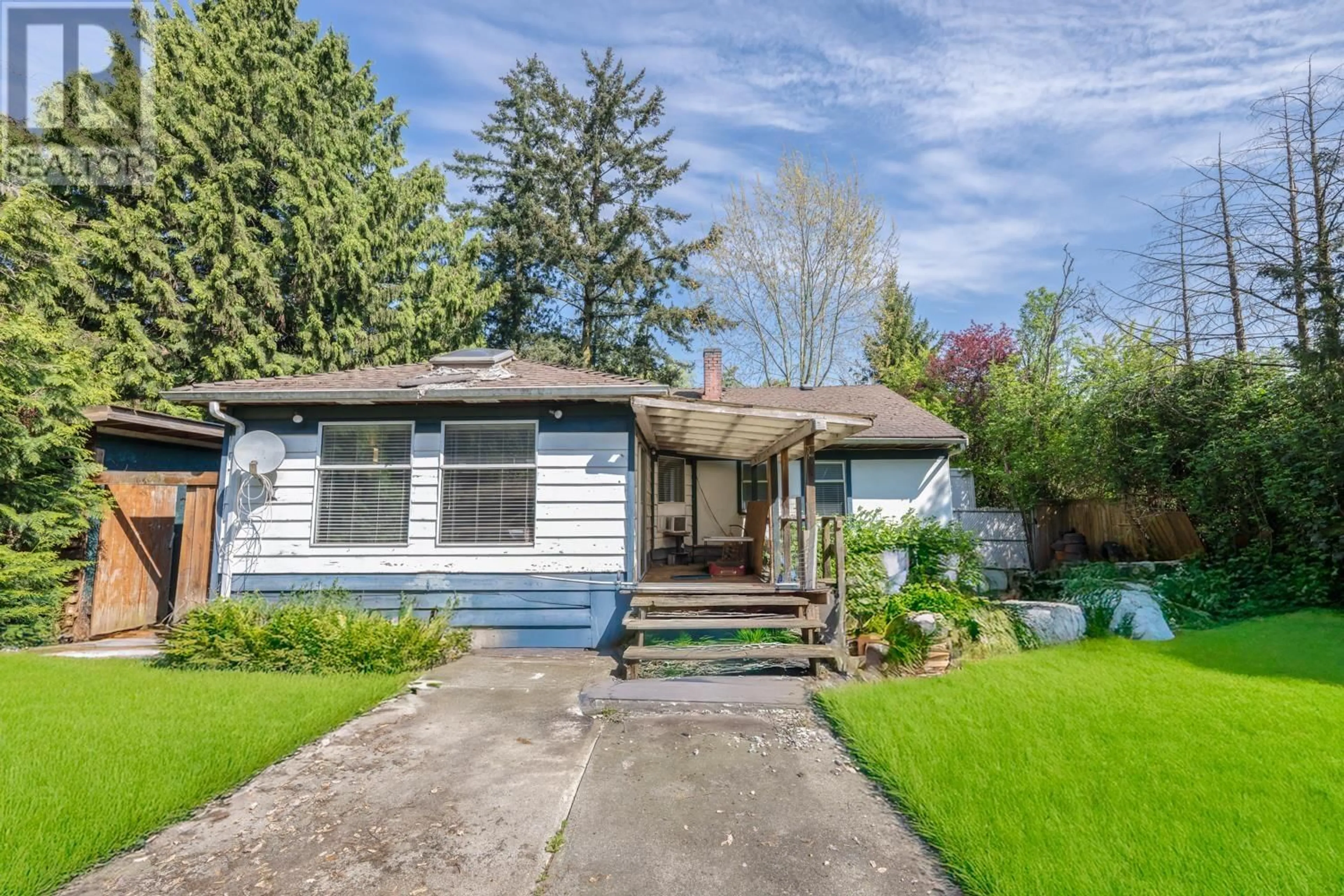 Home with vinyl exterior material, street for 23500 WESTMINSTER HIGHWAY, Richmond British Columbia V6V1C4