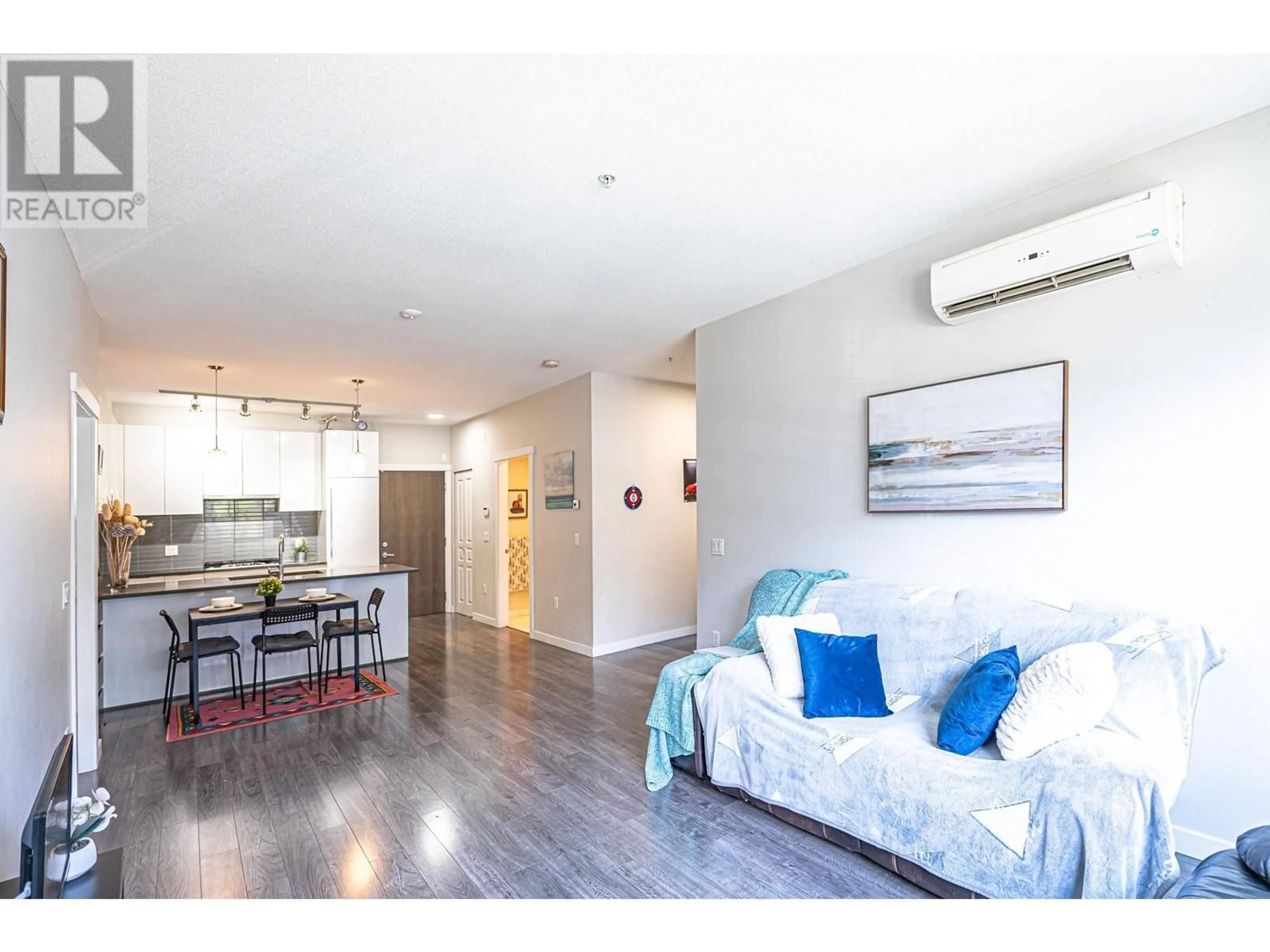 Living room with furniture, wood/laminate floor for 118 - 9388 TOMICKI AVENUE, Richmond British Columbia V6X0P1