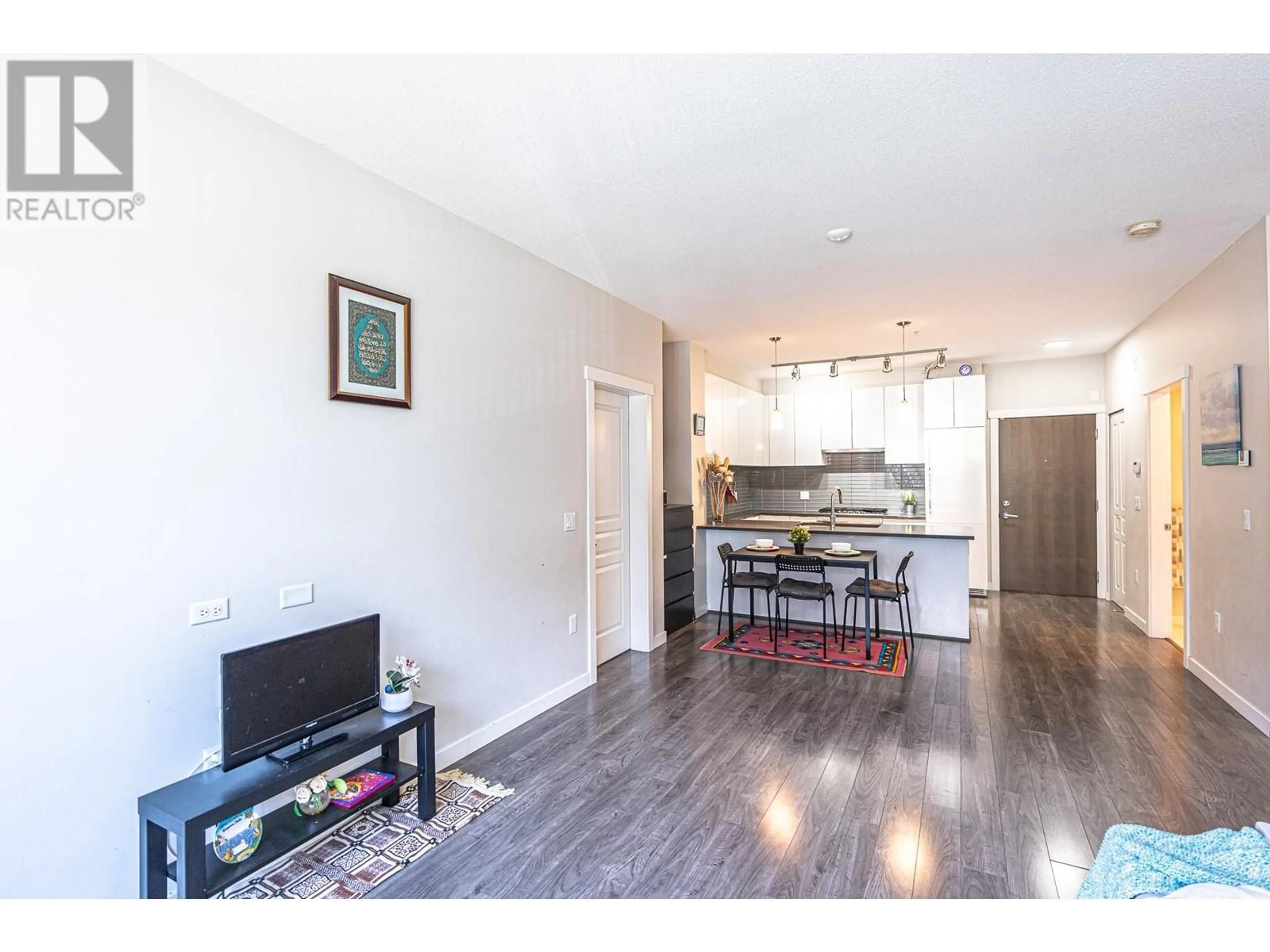 Open concept kitchen, wood/laminate floor for 118 - 9388 TOMICKI AVENUE, Richmond British Columbia V6X0P1