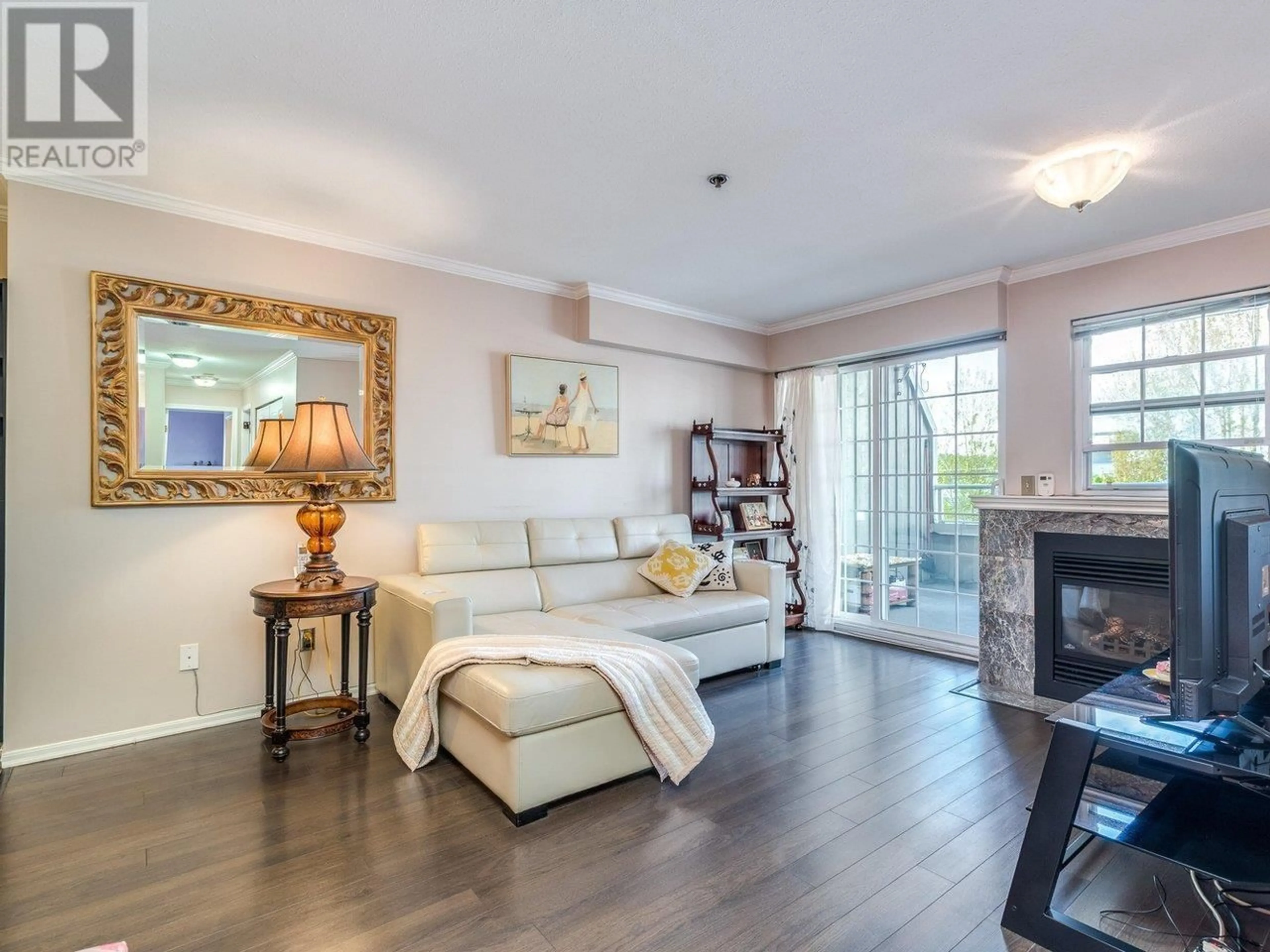 Living room with furniture, wood/laminate floor for 303 - 1154 WESTWOOD STREET, Coquitlam British Columbia V3B7J1