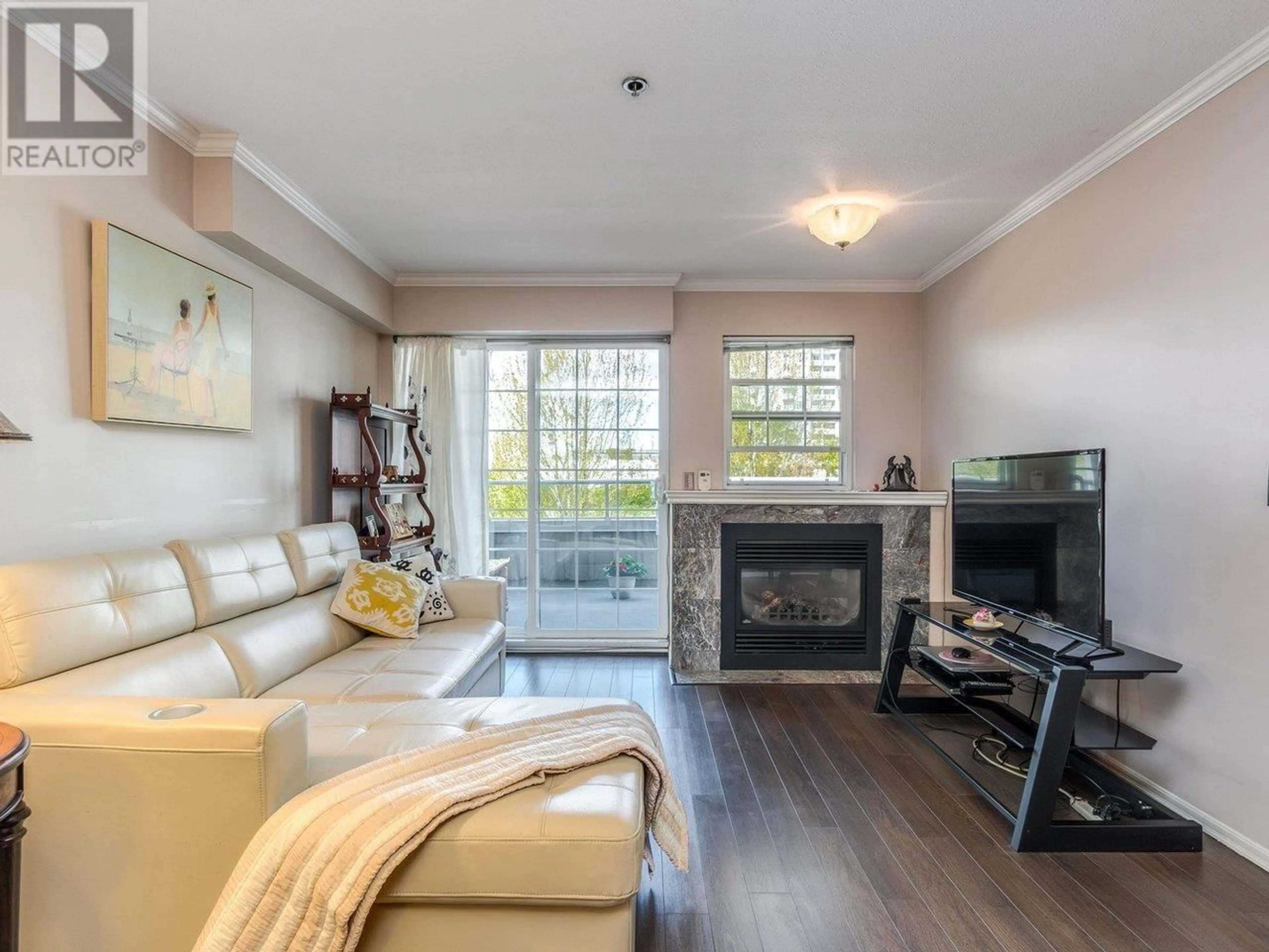 Living room with furniture, wood/laminate floor for 303 - 1154 WESTWOOD STREET, Coquitlam British Columbia V3B7J1