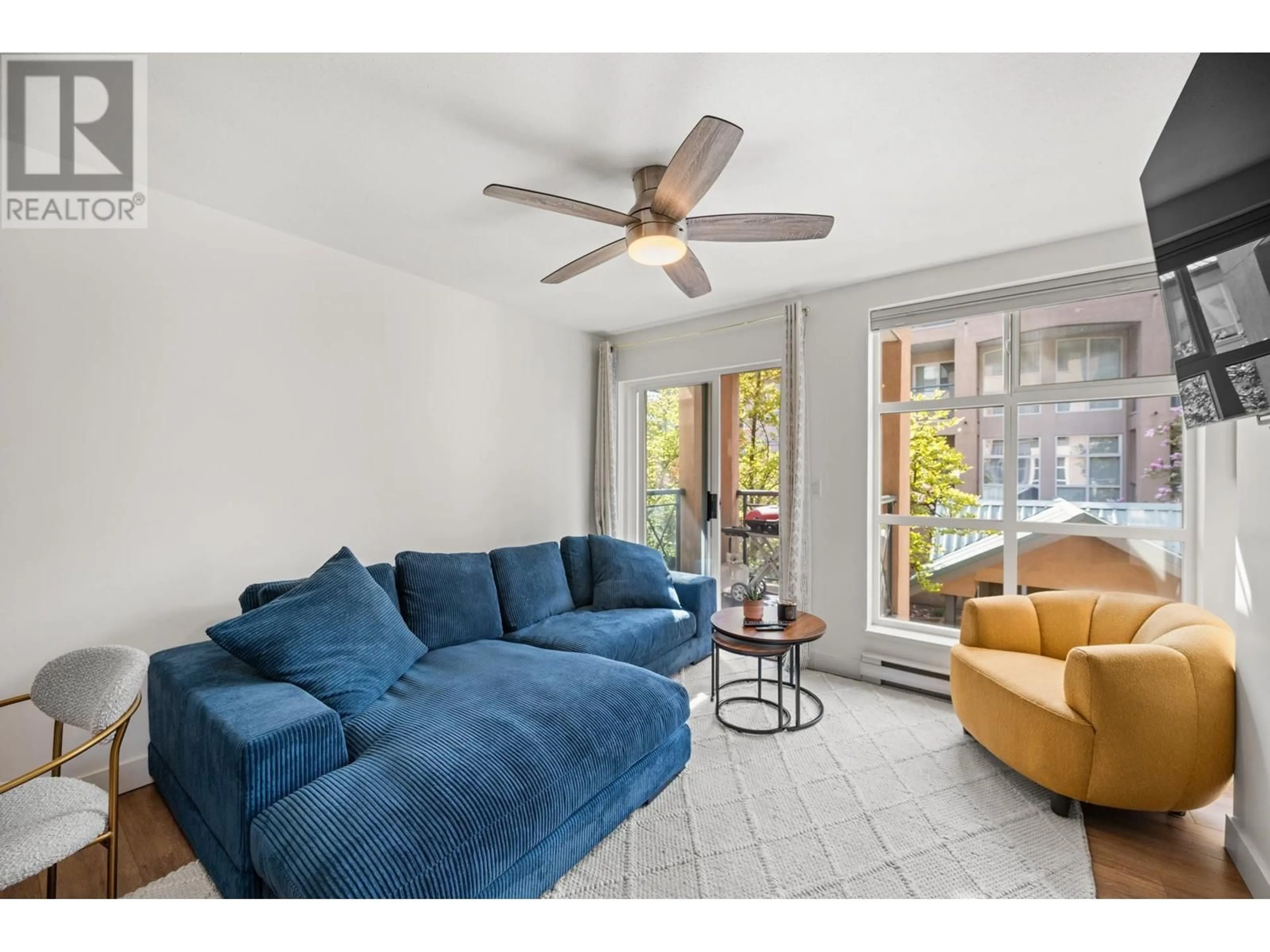 Living room with furniture, unknown for 210 - 2435 WELCHER AVENUE, Port Coquitlam British Columbia V3C1X8
