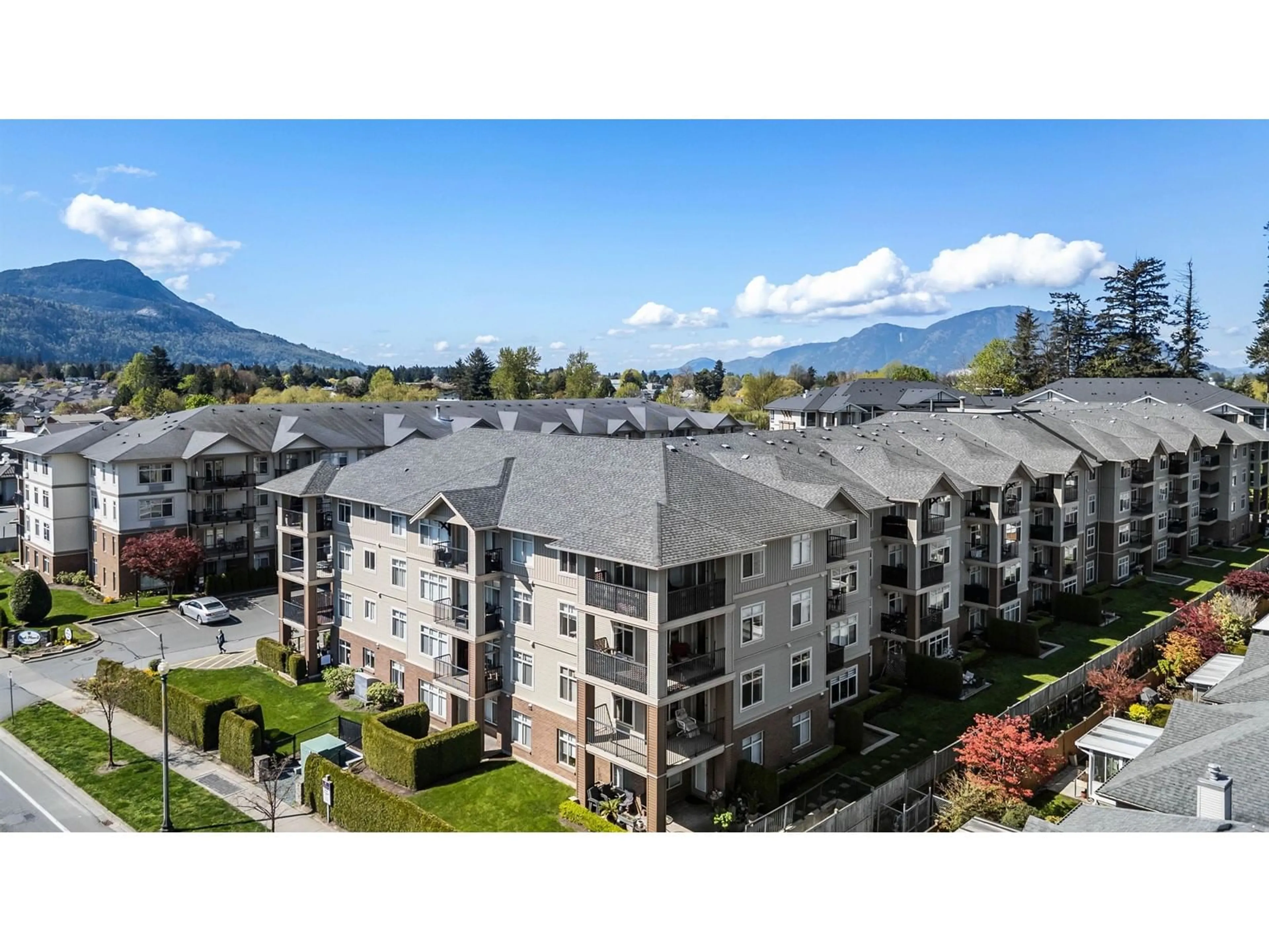 A pic from outside/outdoor area/front of a property/back of a property/a pic from drone, mountain view for 402 - 45769 STEVENSON ROAD, Chilliwack British Columbia V2R5Z2