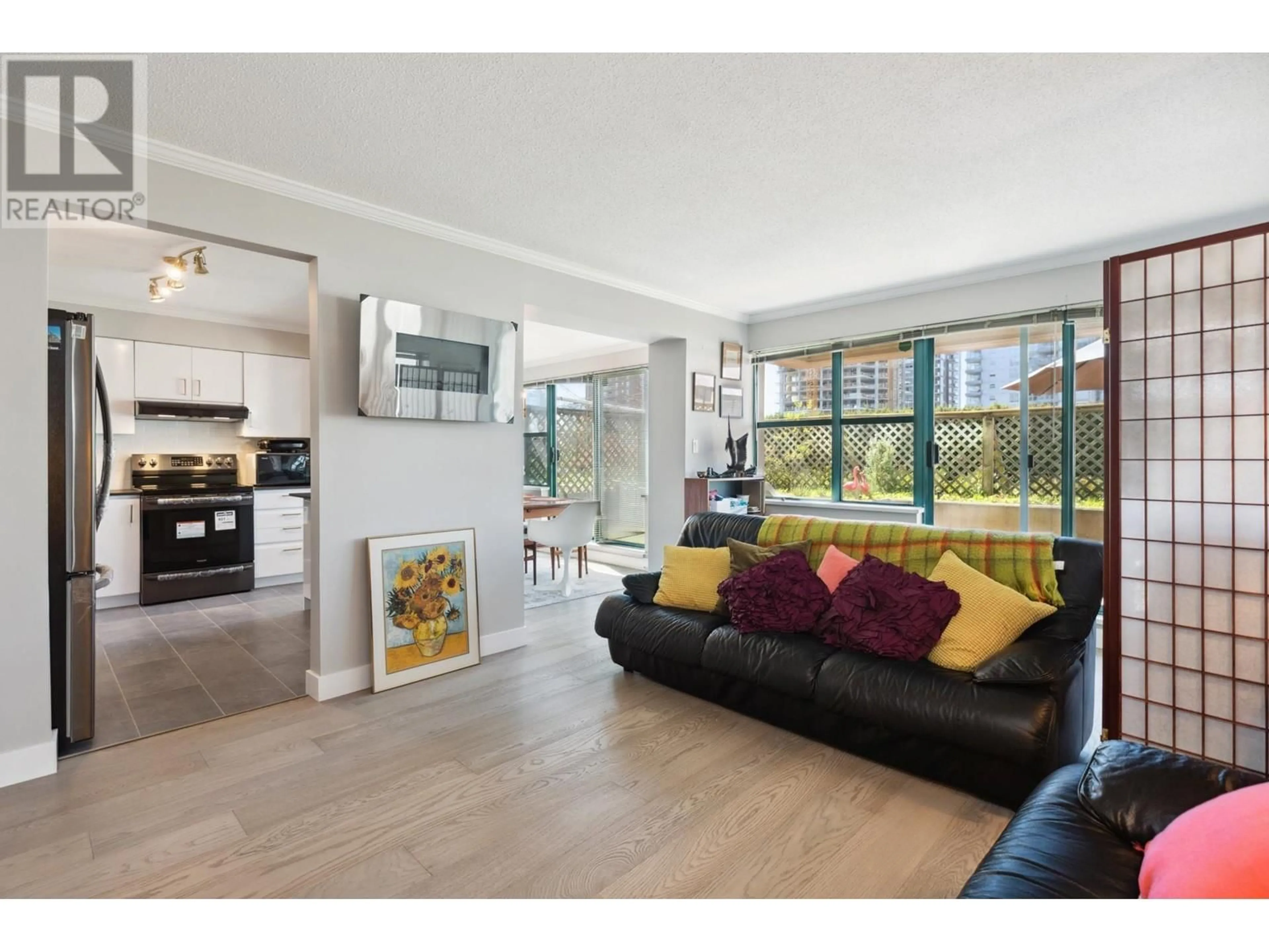 Living room with furniture, unknown for 201 - 1555 EASTERN AVENUE, North Vancouver British Columbia V7L3G2