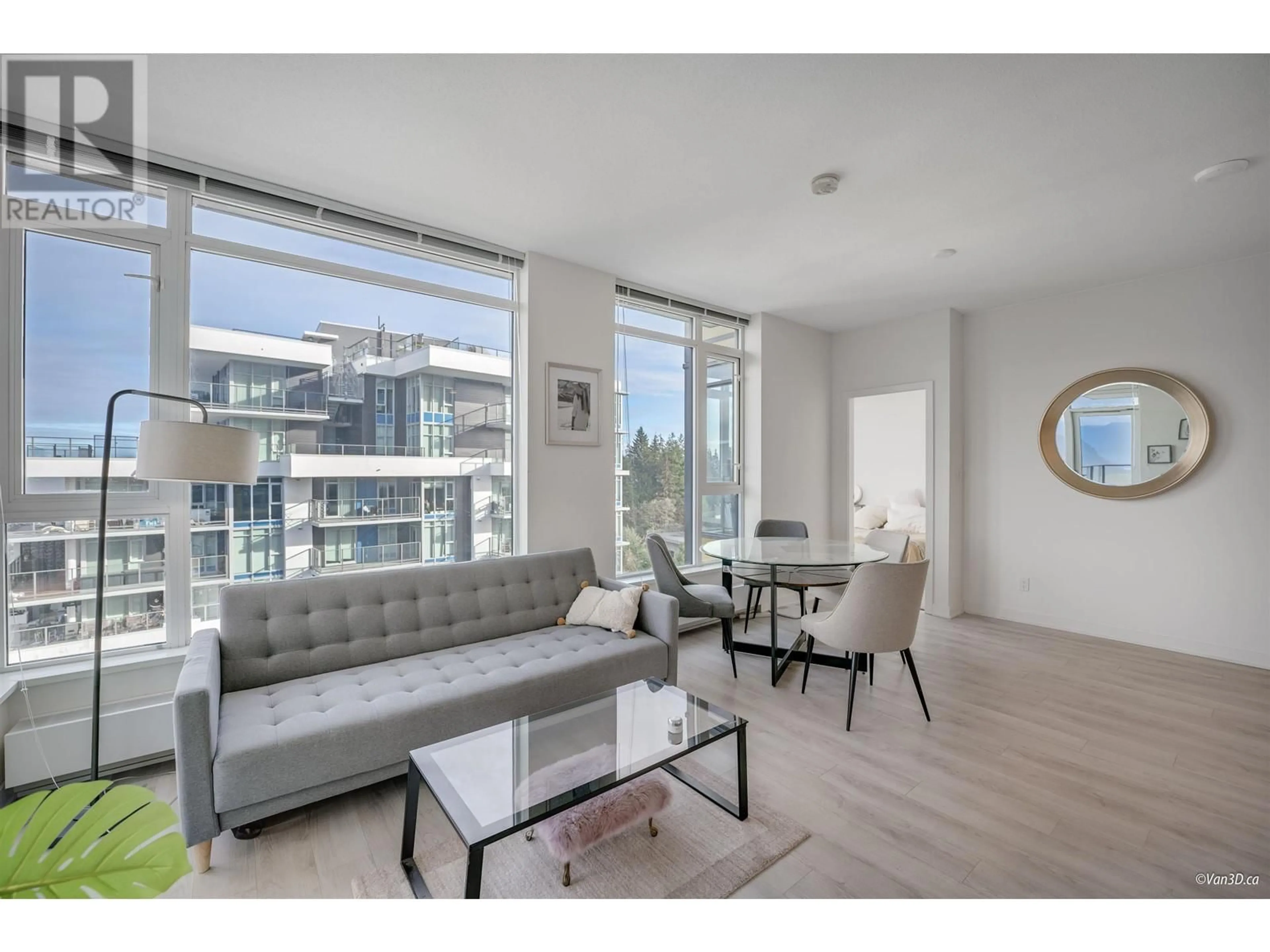 Living room with furniture, wood/laminate floor for 1103 - 8850 UNIVERSITY CRESCENT, Burnaby British Columbia V5A0C8