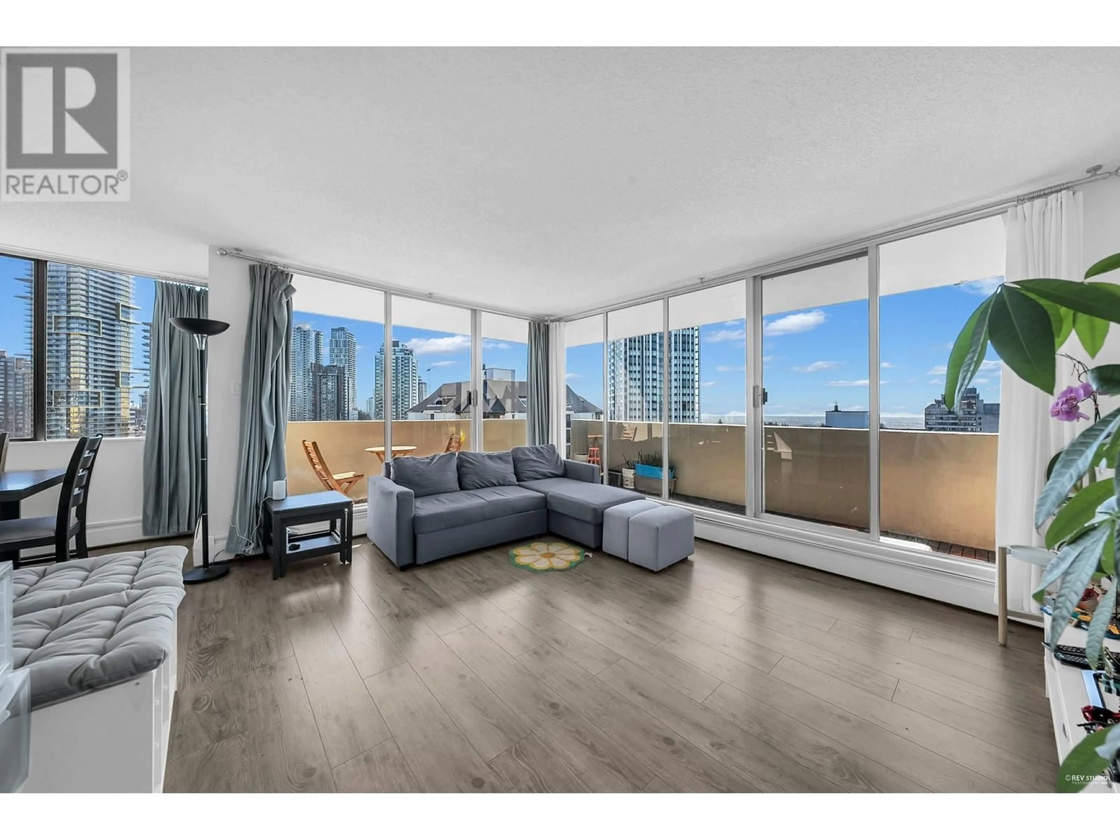 Living room with furniture, wood/laminate floor for 1802 - 4300 MAYBERRY STREET, Burnaby British Columbia V5H4A4