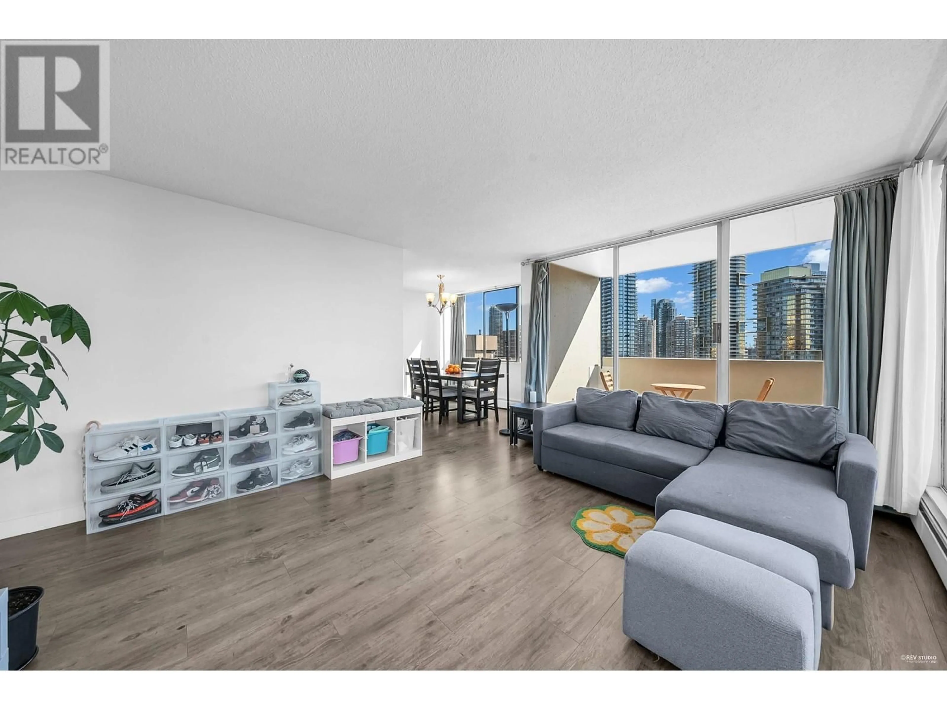 Living room with furniture, wood/laminate floor for 1802 - 4300 MAYBERRY STREET, Burnaby British Columbia V5H4A4