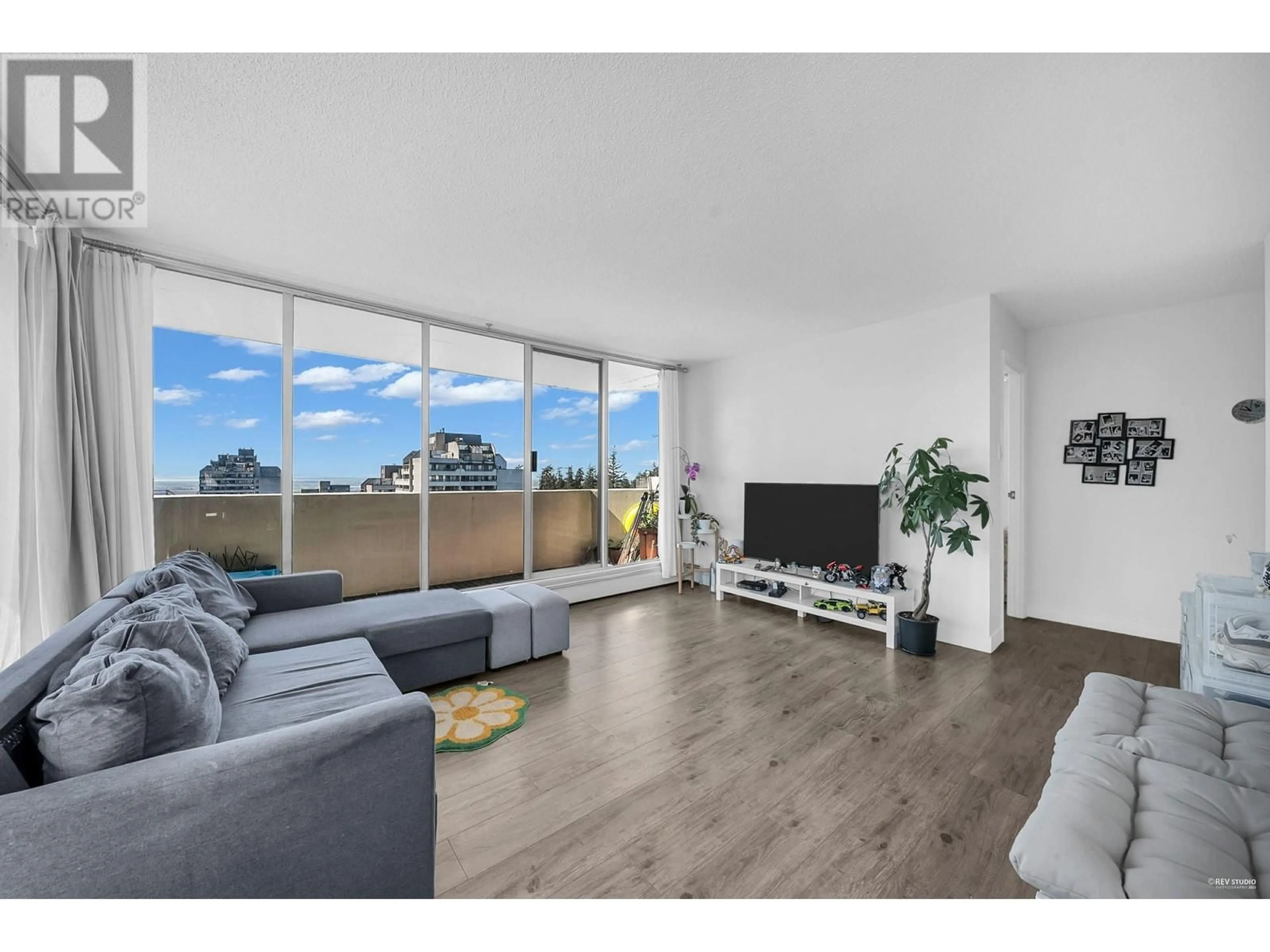 Living room with furniture, wood/laminate floor for 1802 - 4300 MAYBERRY STREET, Burnaby British Columbia V5H4A4