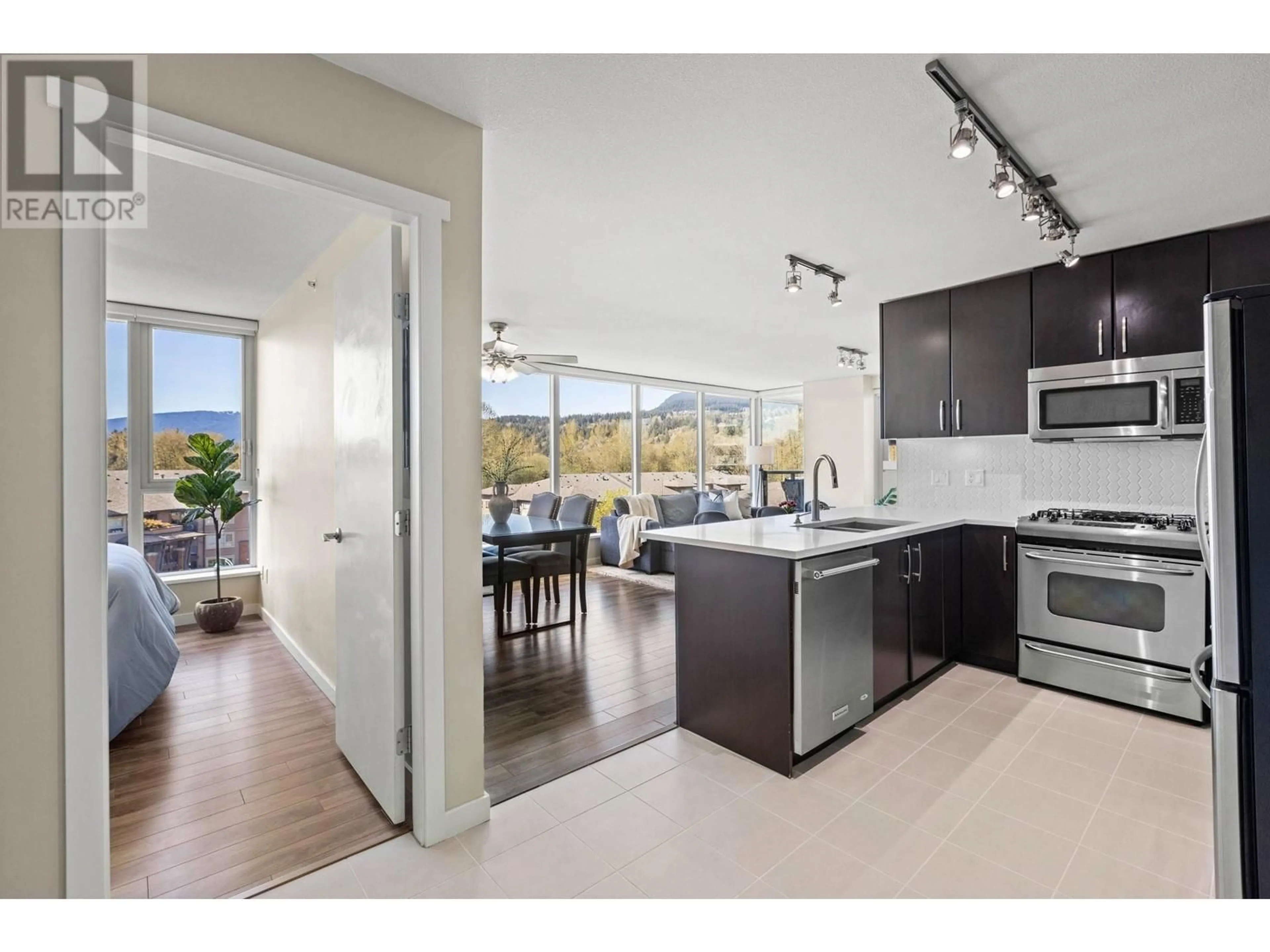 Open concept kitchen, ceramic/tile floor for 706 - 651 NOOTKA WAY, Port Moody British Columbia V3H0A1
