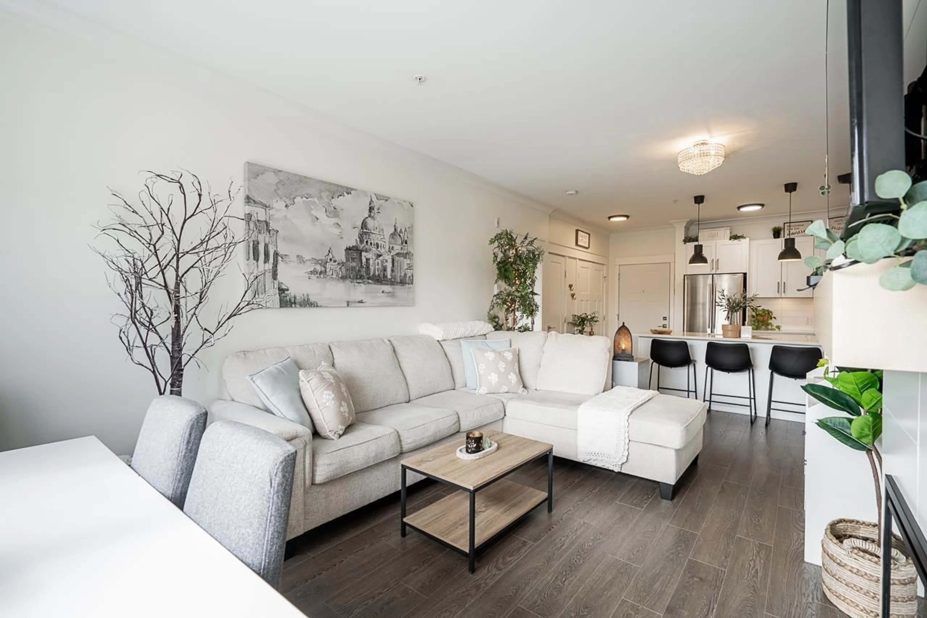 Living room with furniture, wood/laminate floor for 321 - 5020 221A, Langley British Columbia V2Y0V5