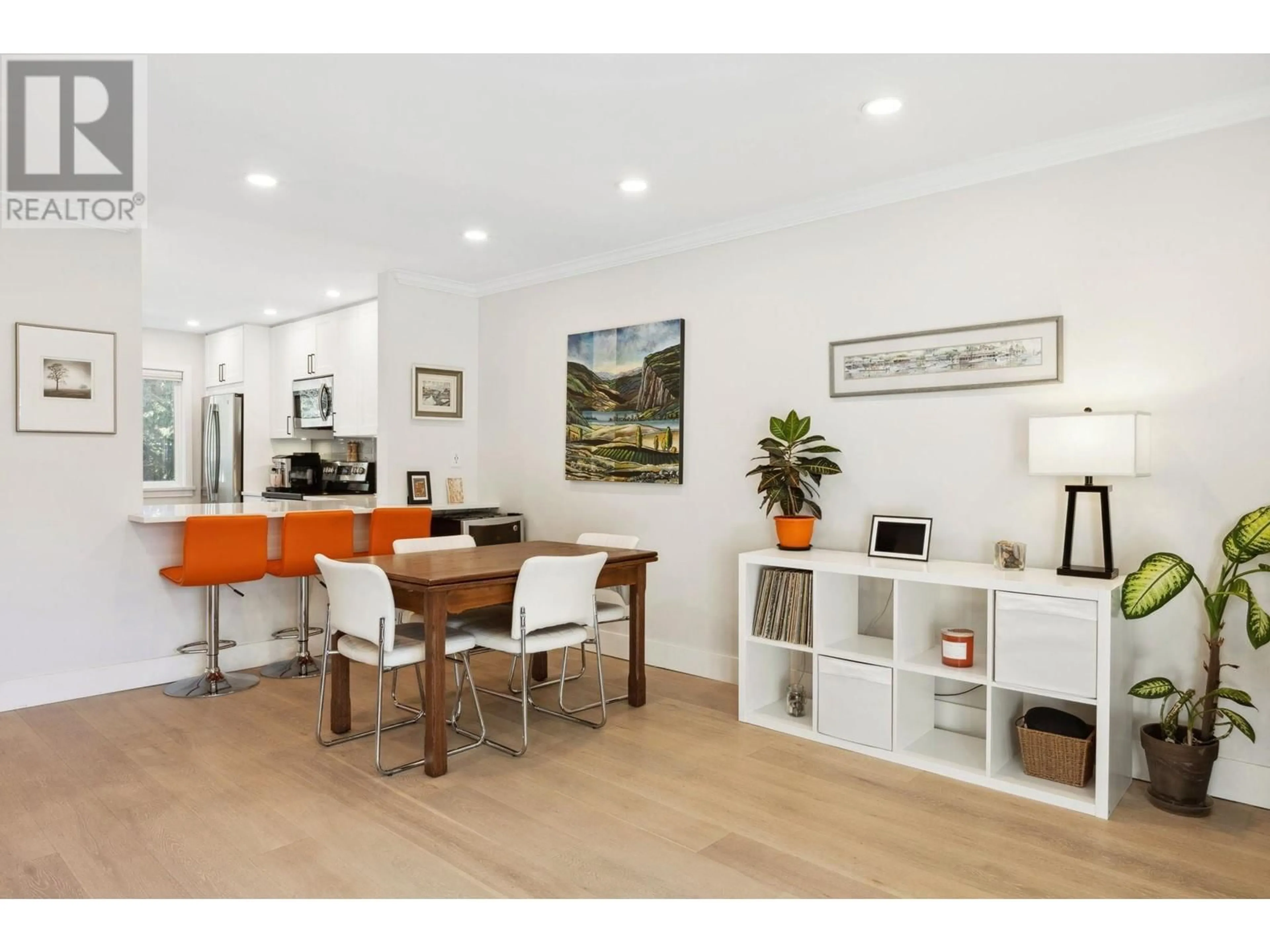 Open concept kitchen, wood/laminate floor for 1277 EMERY PLACE, North Vancouver British Columbia V7J1R2