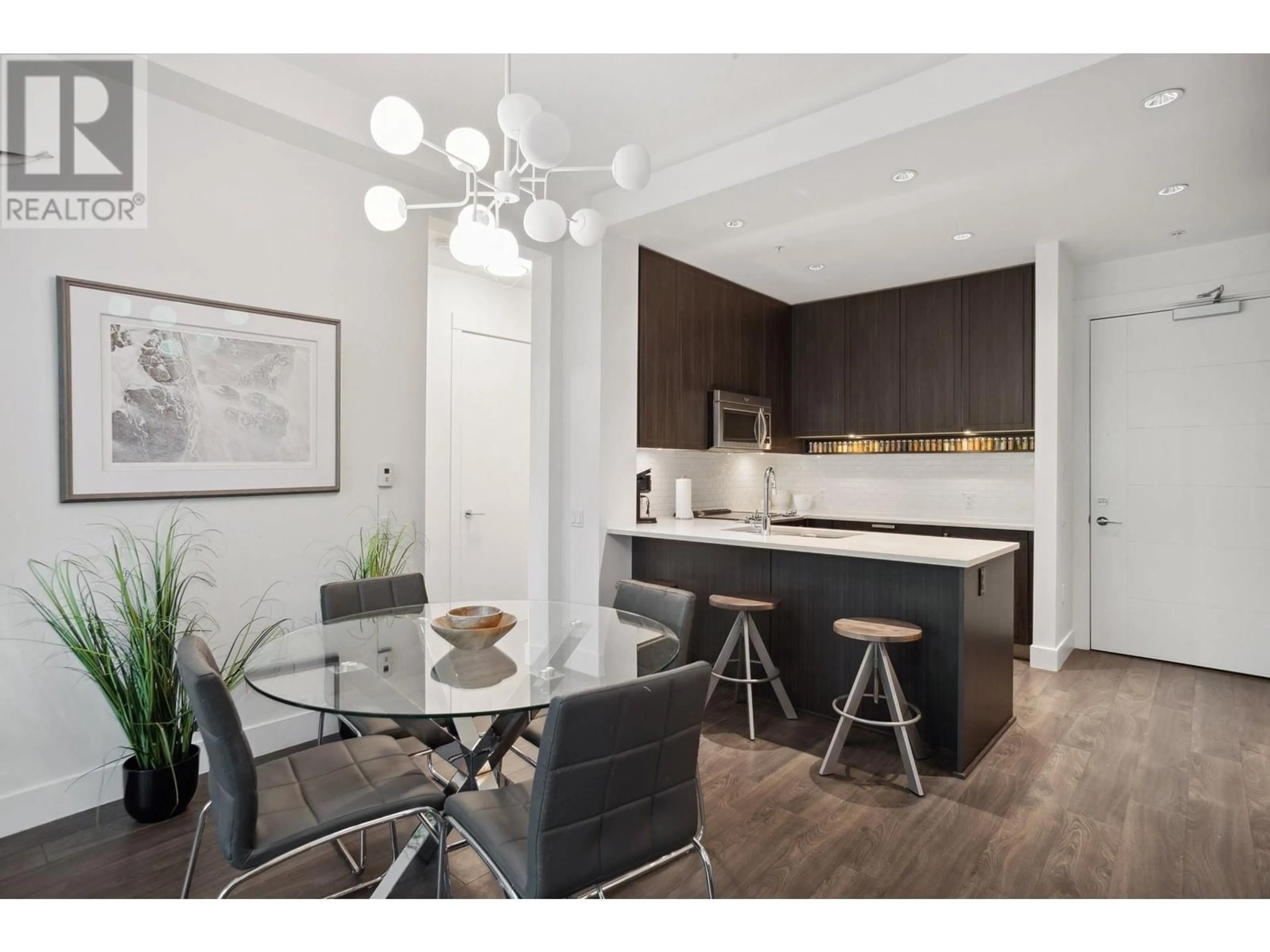 Open concept kitchen, wood/laminate floor for 107 - 550 SEABORNE PLACE, Port Coquitlam British Columbia V3B0L3