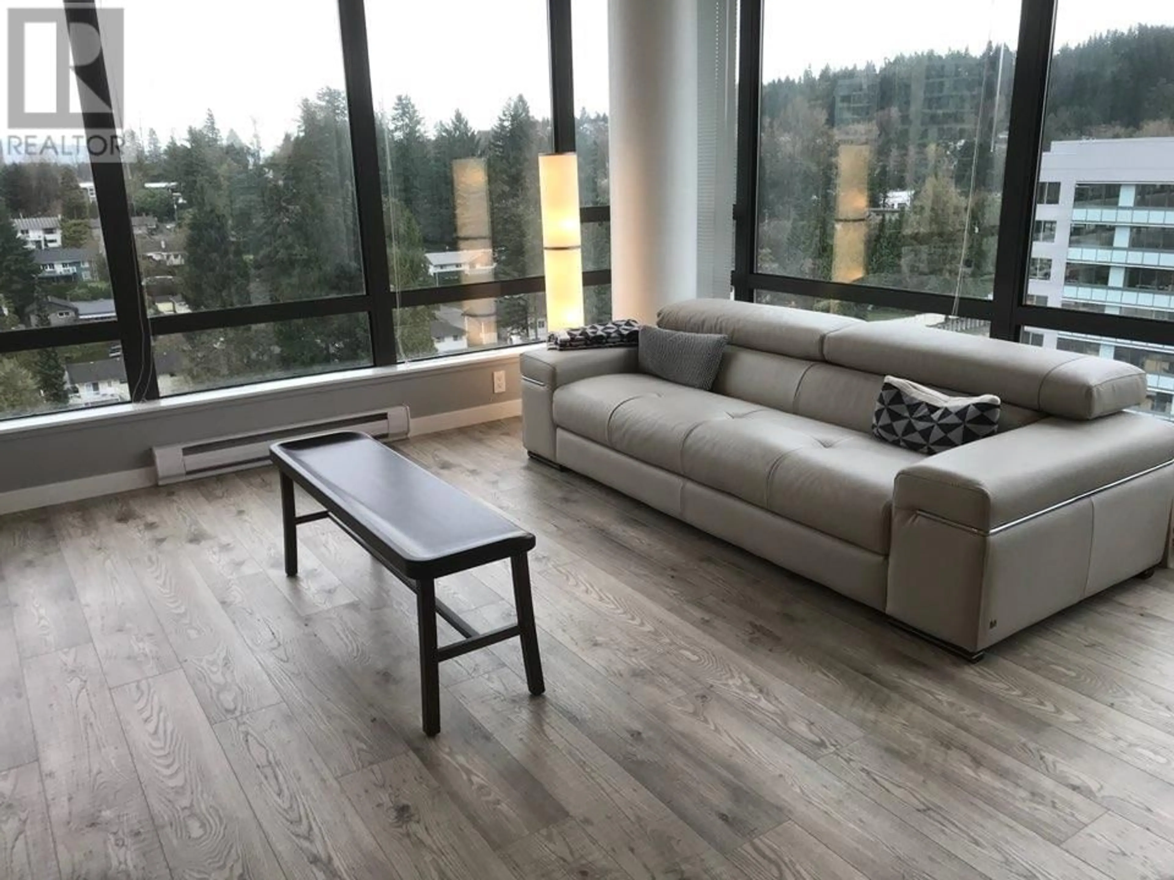 Living room with furniture, wood/laminate floor for 1502 - 110 BREW STREET, Port Moody British Columbia V3H0E4