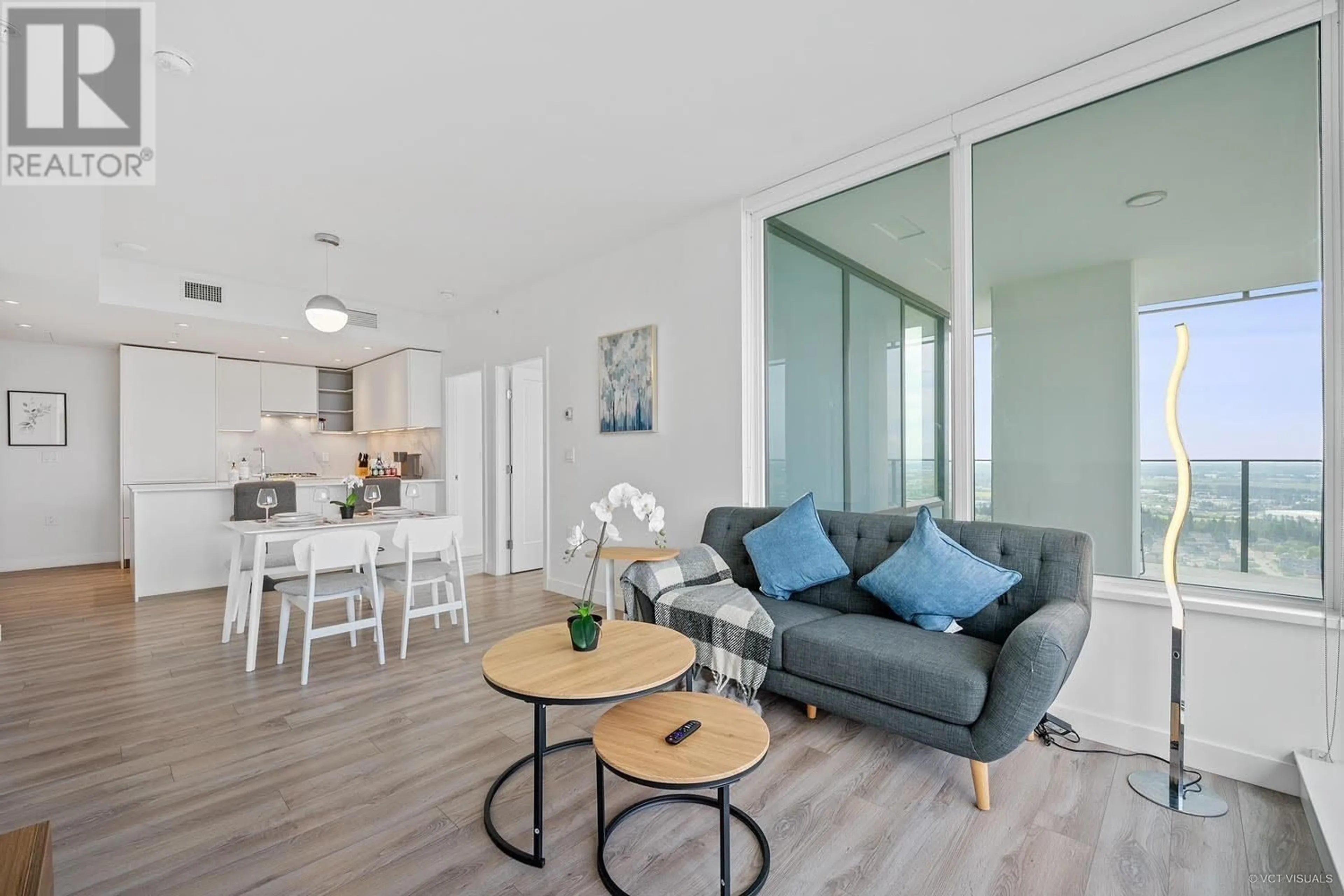 Living room with furniture, wood/laminate floor for 2709 - 6699 DUNBLANE AVENUE, Burnaby British Columbia V5H0J8