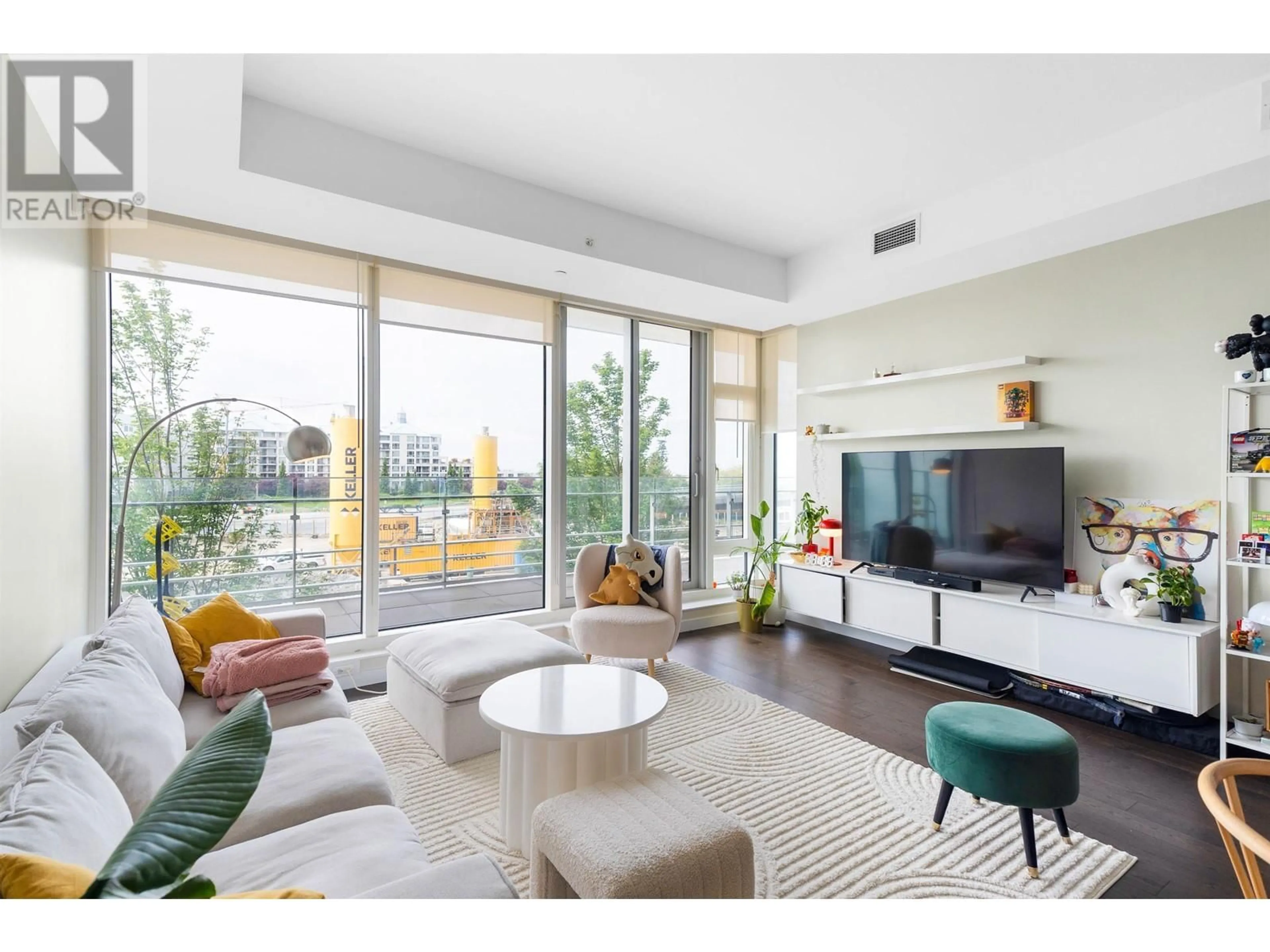 Living room with furniture, unknown for 310 - 5177 BRIGHOUSE WAY, Richmond British Columbia V7C0A7