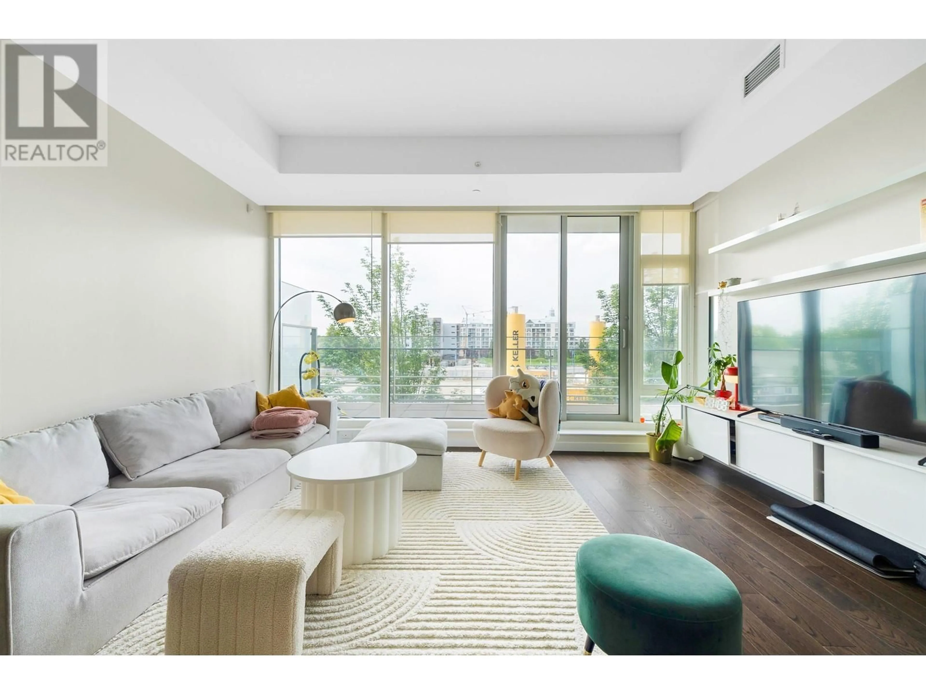 Living room with furniture, unknown for 310 - 5177 BRIGHOUSE WAY, Richmond British Columbia V7C0A7