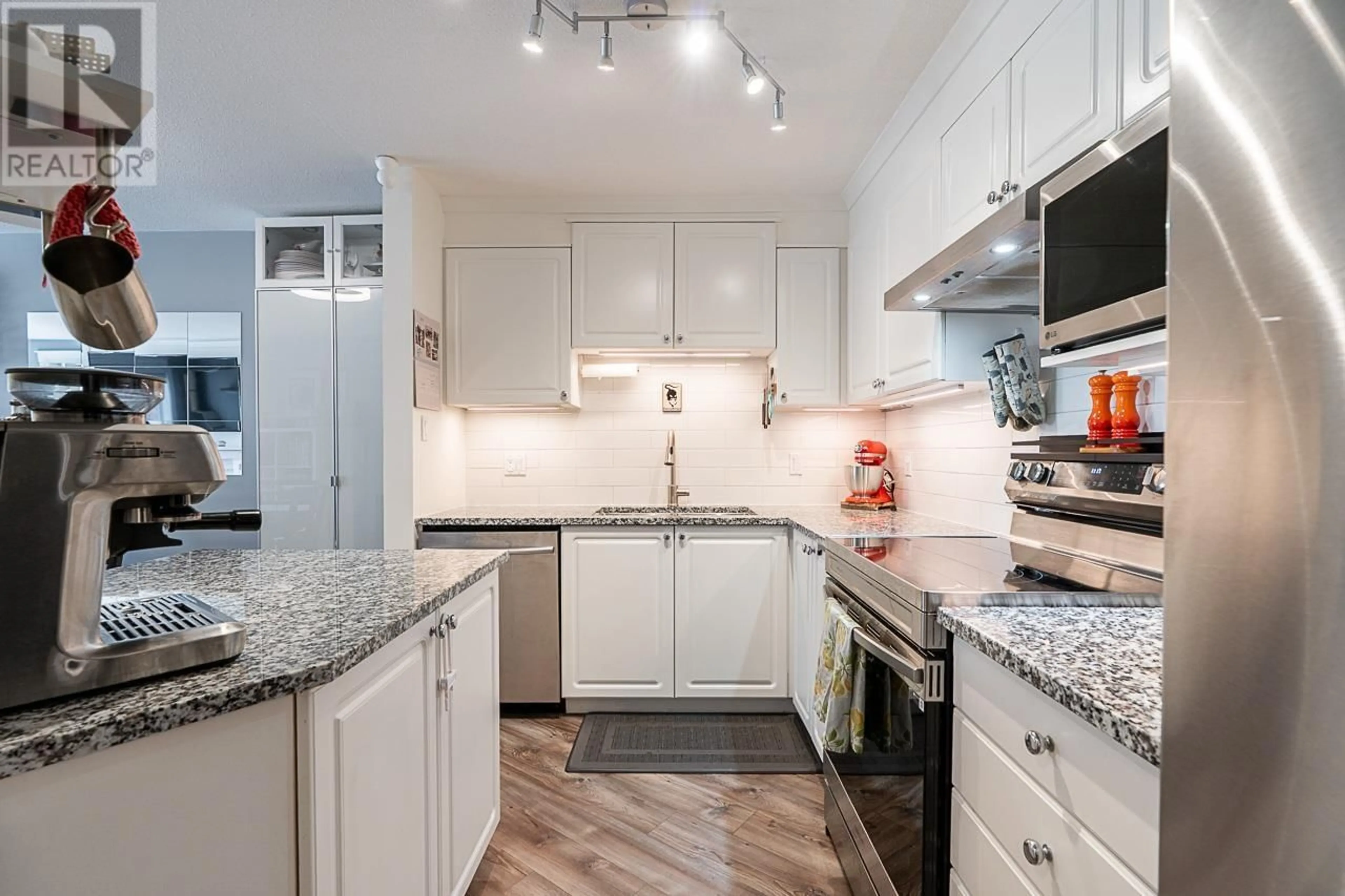 Open concept kitchen, unknown for 216 - 2559 PARKVIEW LANE, Port Coquitlam British Columbia V3C6M1