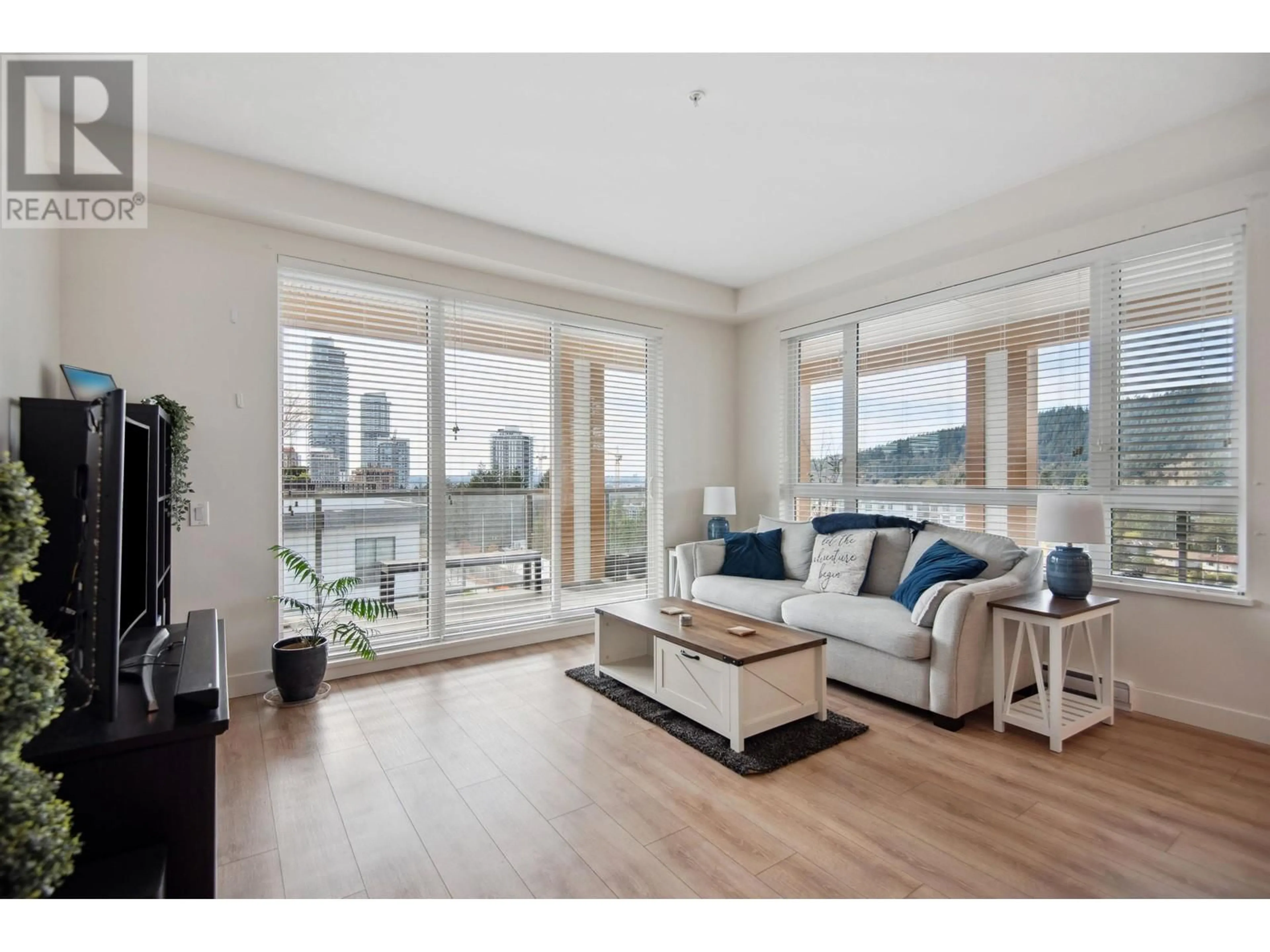 Living room with furniture, wood/laminate floor for 608 - 721 ANSKAR COURT, Coquitlam British Columbia V3J0L4
