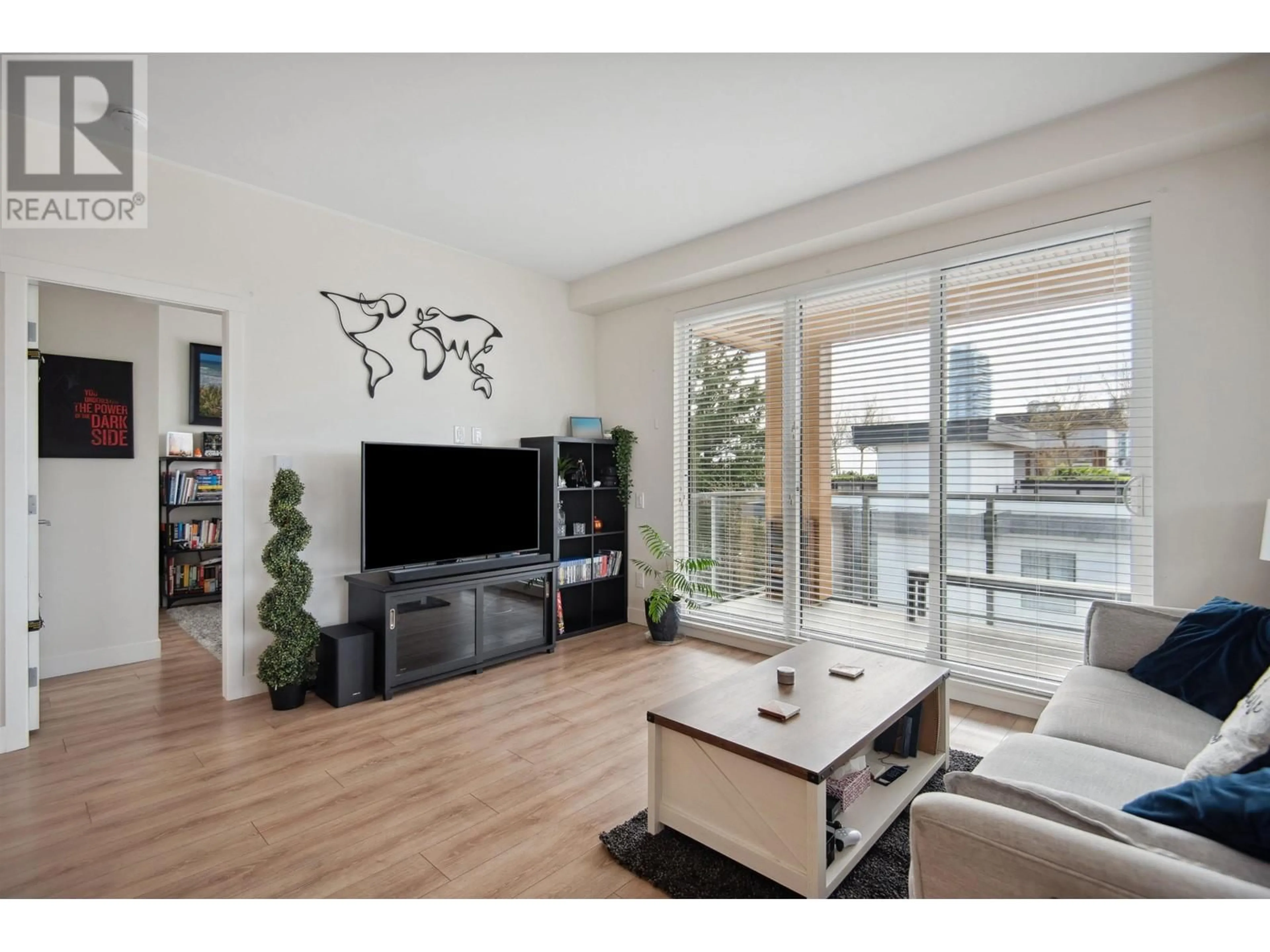 Living room with furniture, wood/laminate floor for 608 - 721 ANSKAR COURT, Coquitlam British Columbia V3J0L4