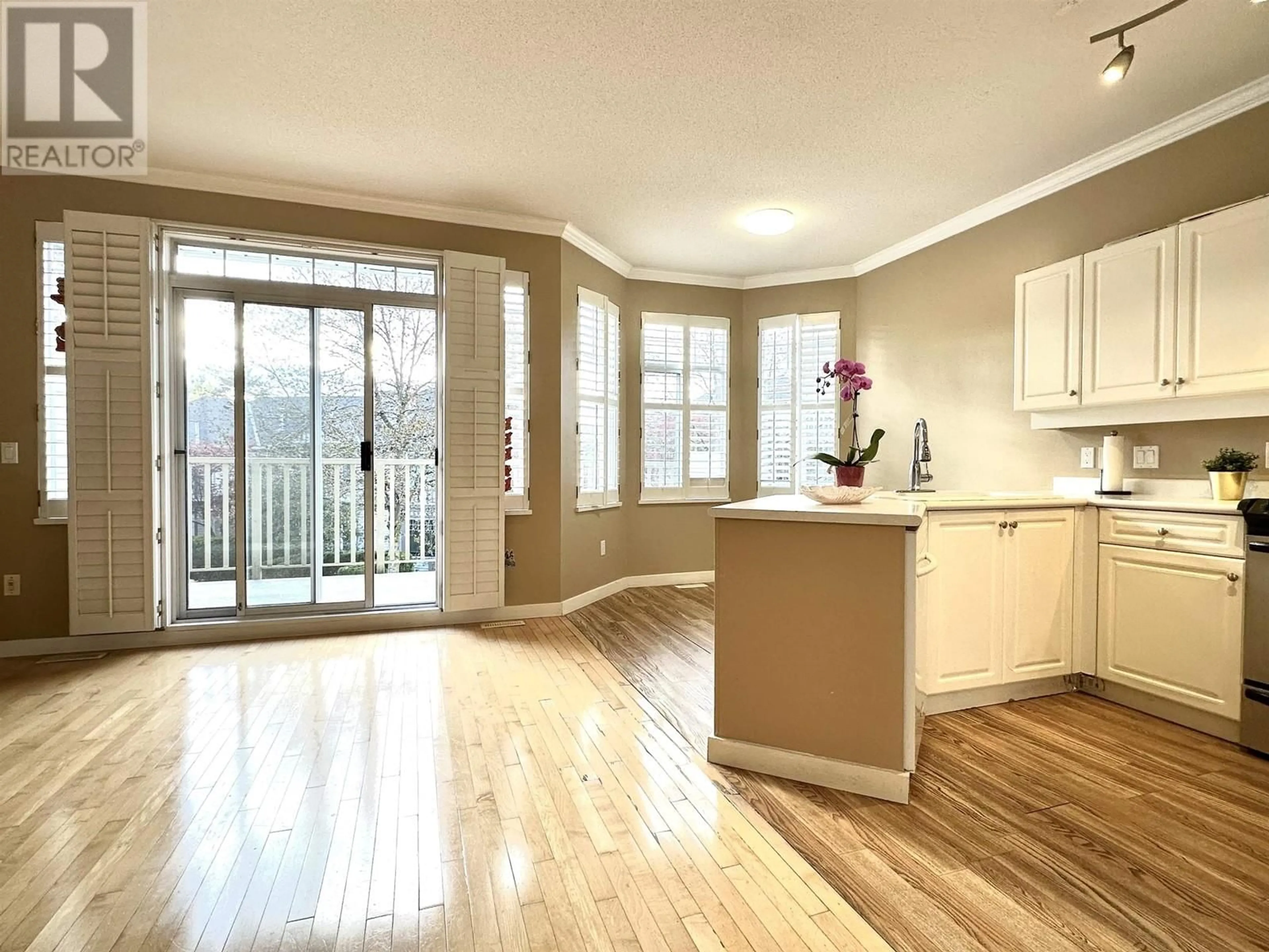 Open concept kitchen, wood/laminate floor for 26 - 7500 CUMBERLAND STREET, Burnaby British Columbia V3N4Z9