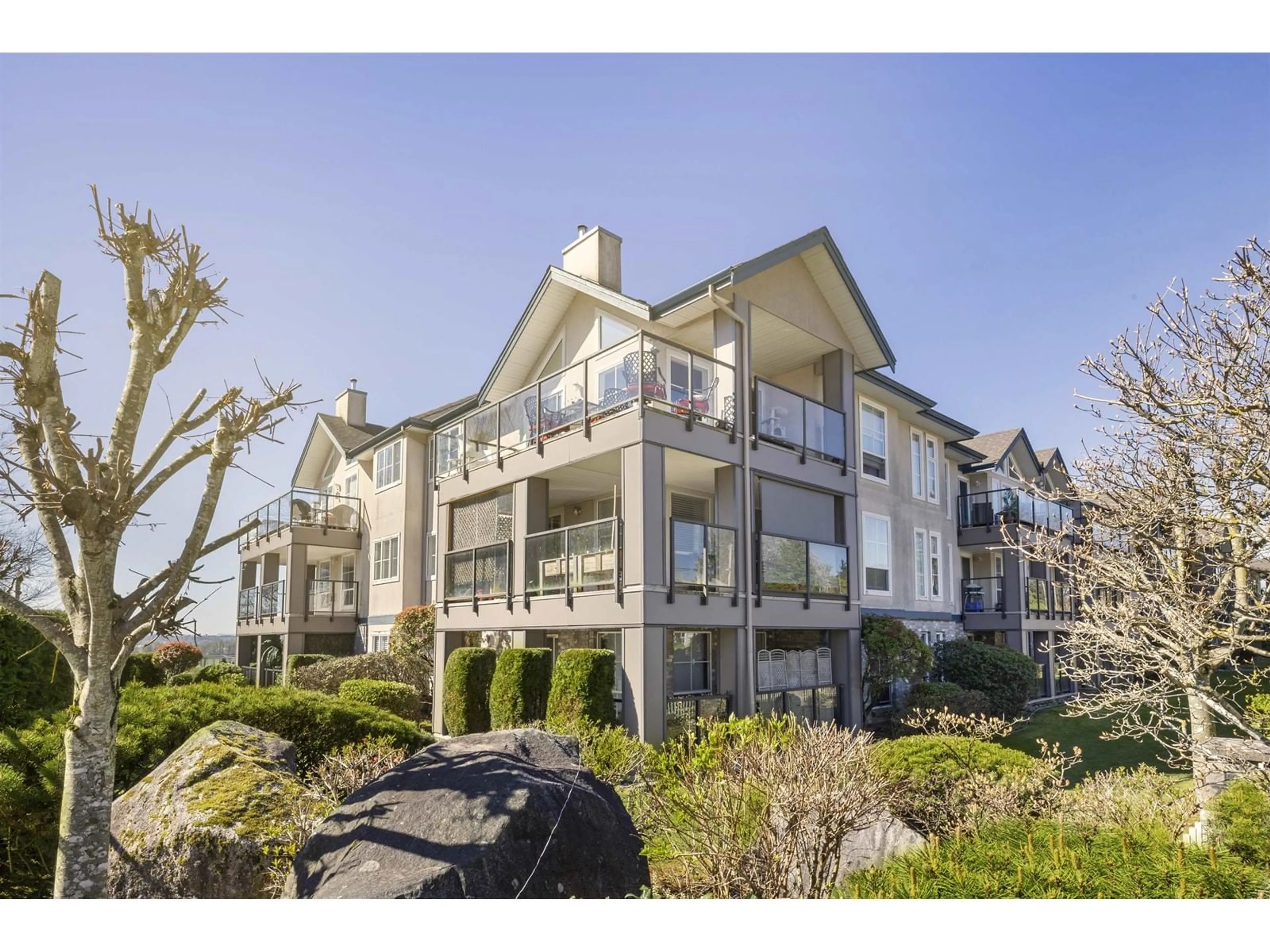 A pic from outside/outdoor area/front of a property/back of a property/a pic from drone, water/lake/river/ocean view for 303 - 33150 4TH, Mission British Columbia V2V7A3