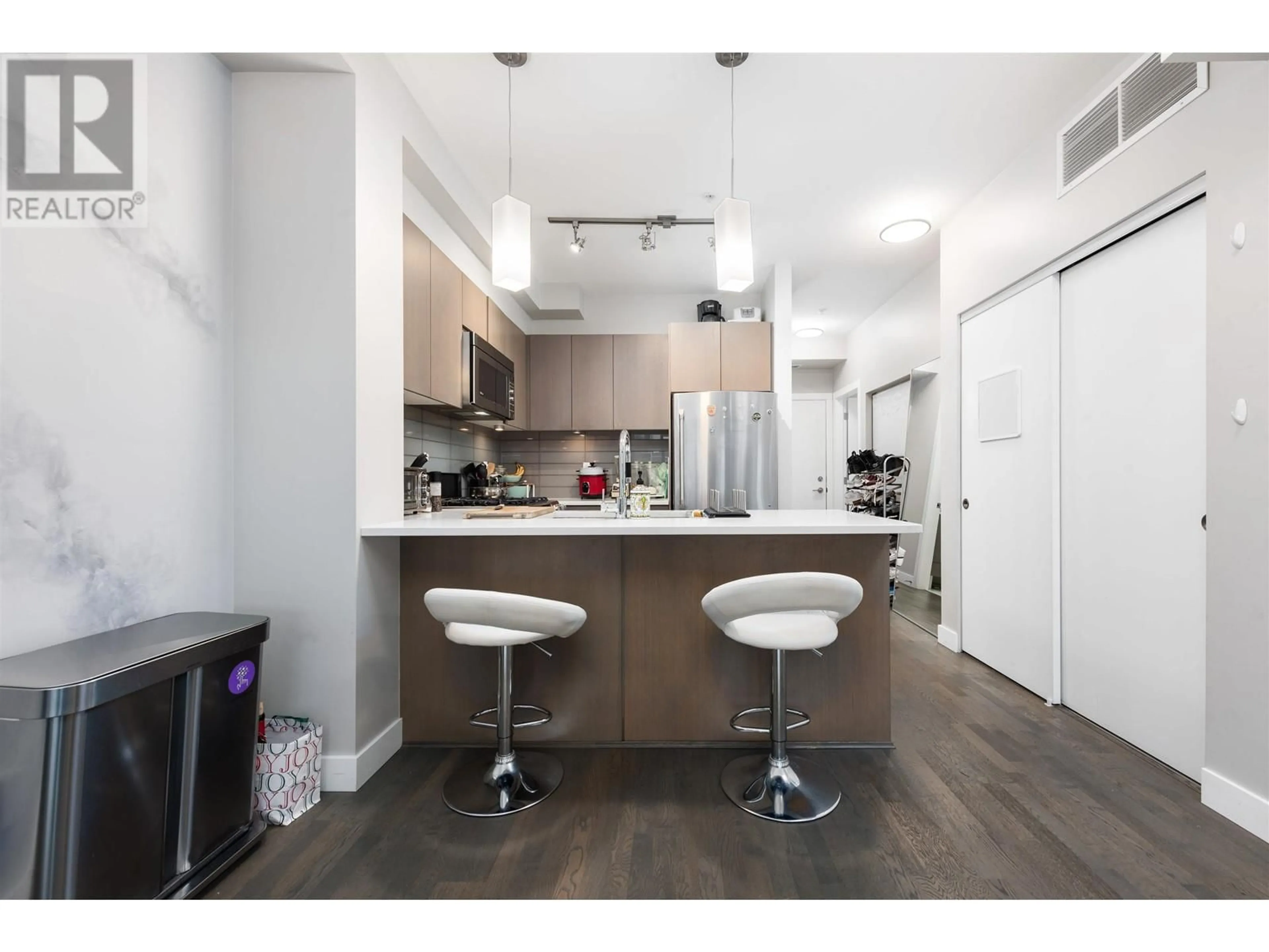 Open concept kitchen, wood/laminate floor for 516 - 10033 RIVER DRIVE, Richmond British Columbia V6X0L2
