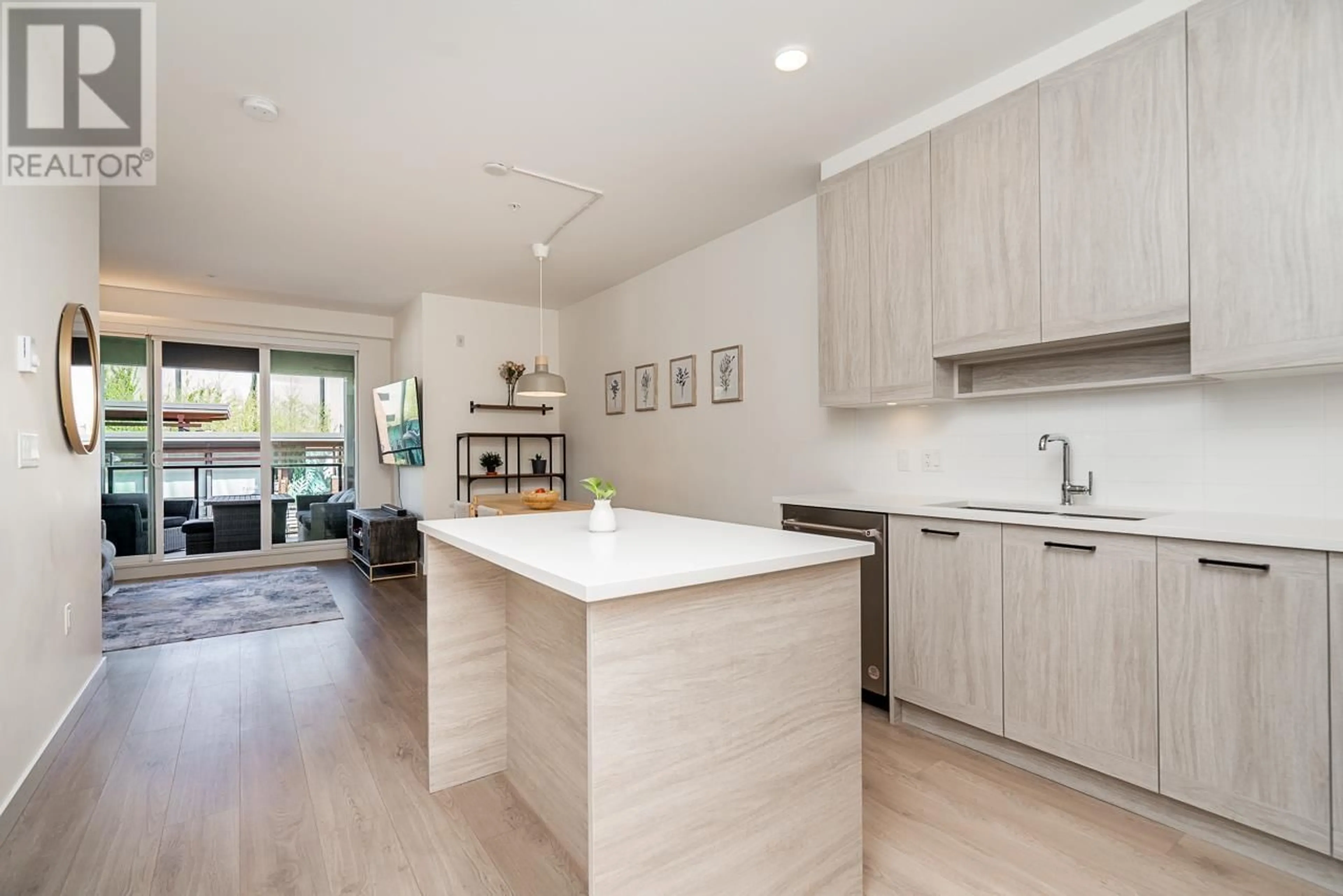 Open concept kitchen, wood/laminate floor for 213 - 7579 16TH STREET, Burnaby British Columbia V3N0H7