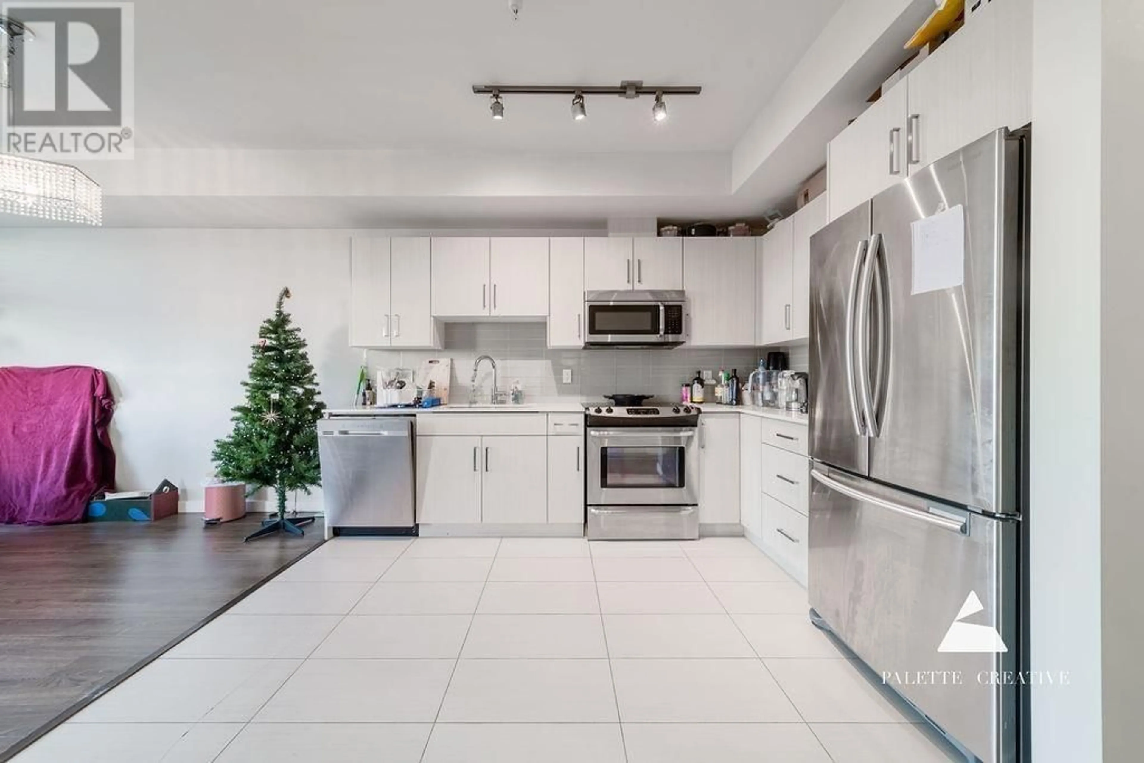 Open concept kitchen, ceramic/tile floor for 206 - 5288 GRIMMER STREET, Burnaby British Columbia V5H0C5